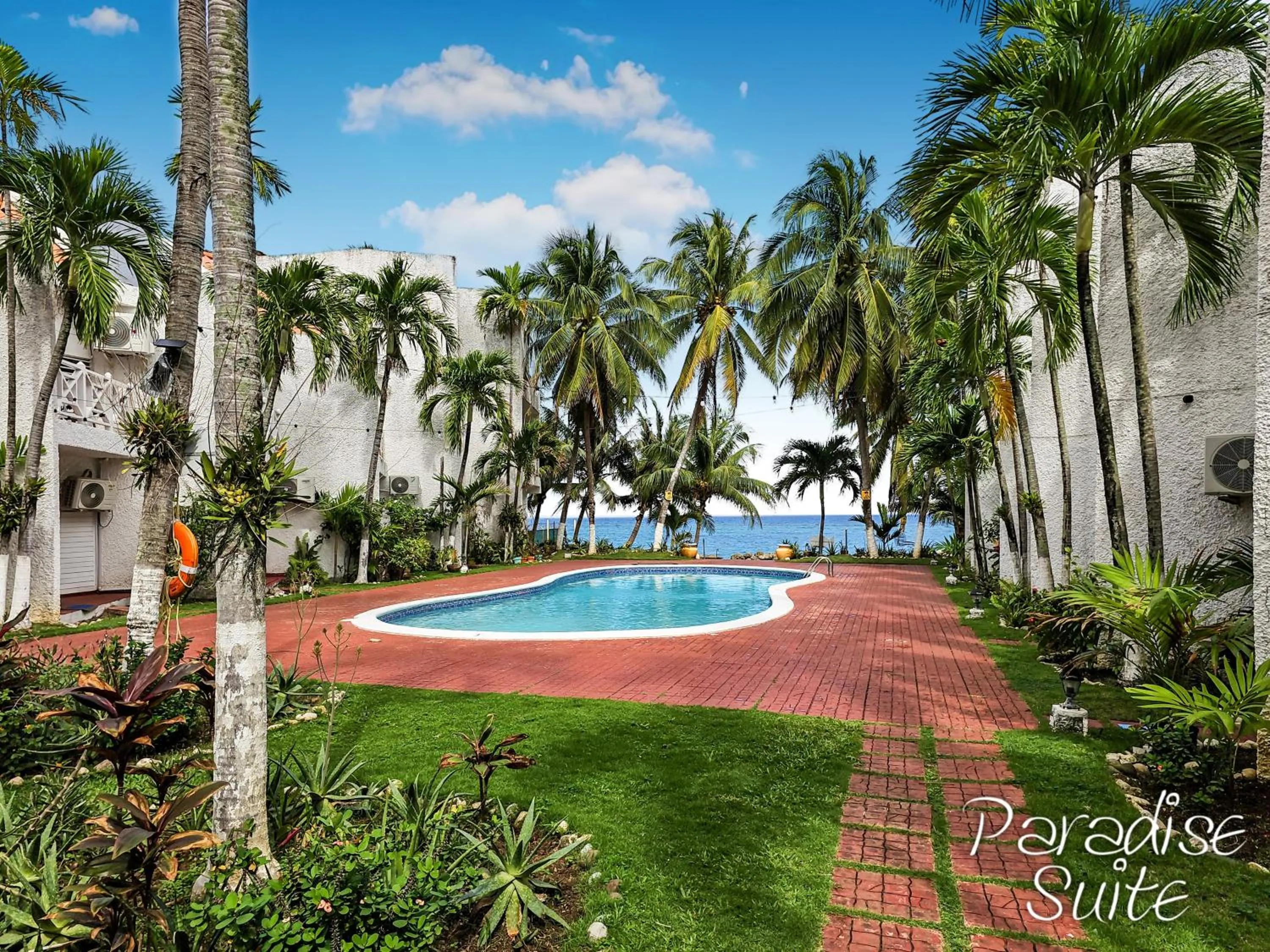 Pool view in Chrisanns Paradise Suite by the Ocean - Apt#9