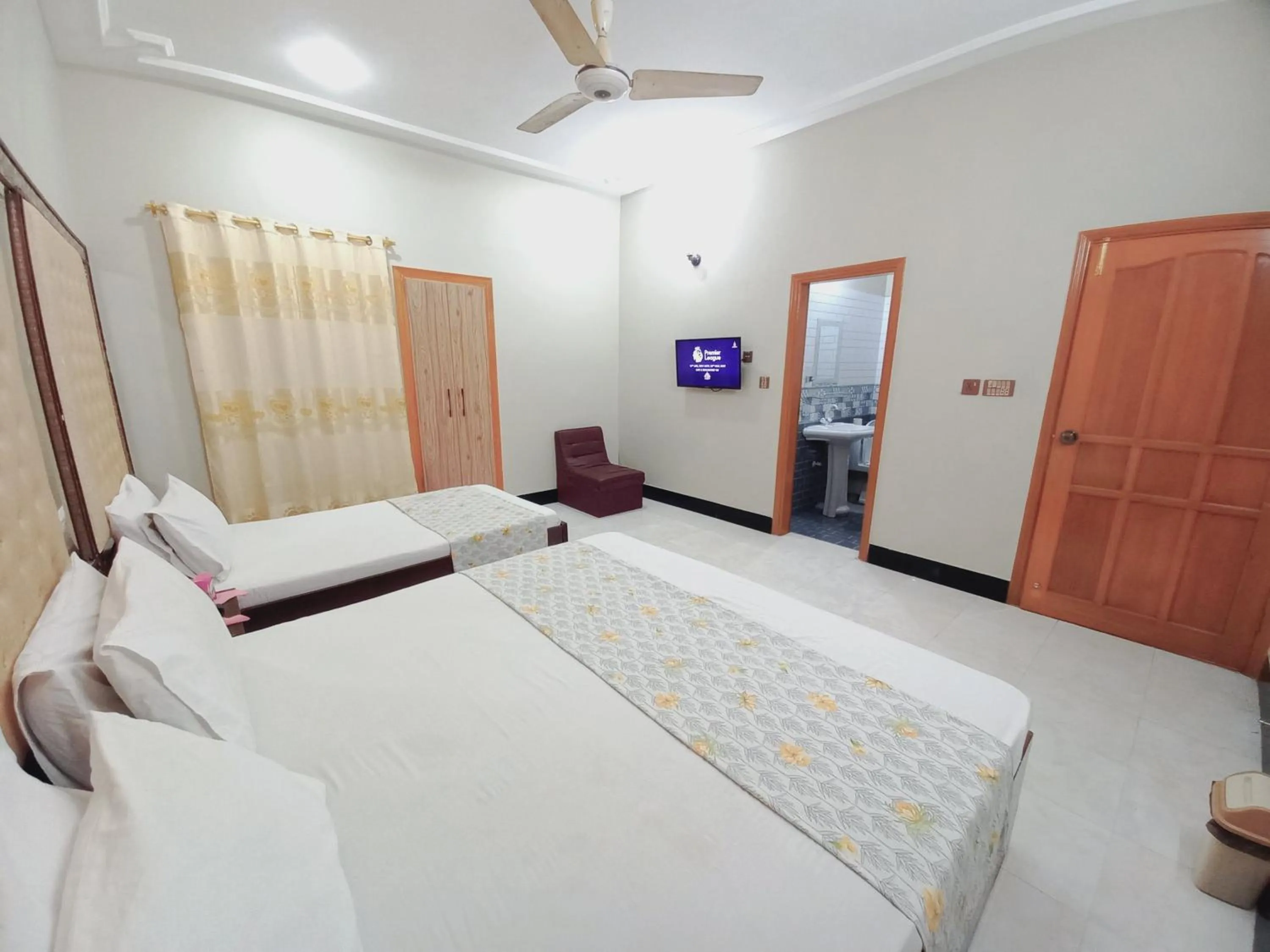 Bed in Rose Palace Guest House