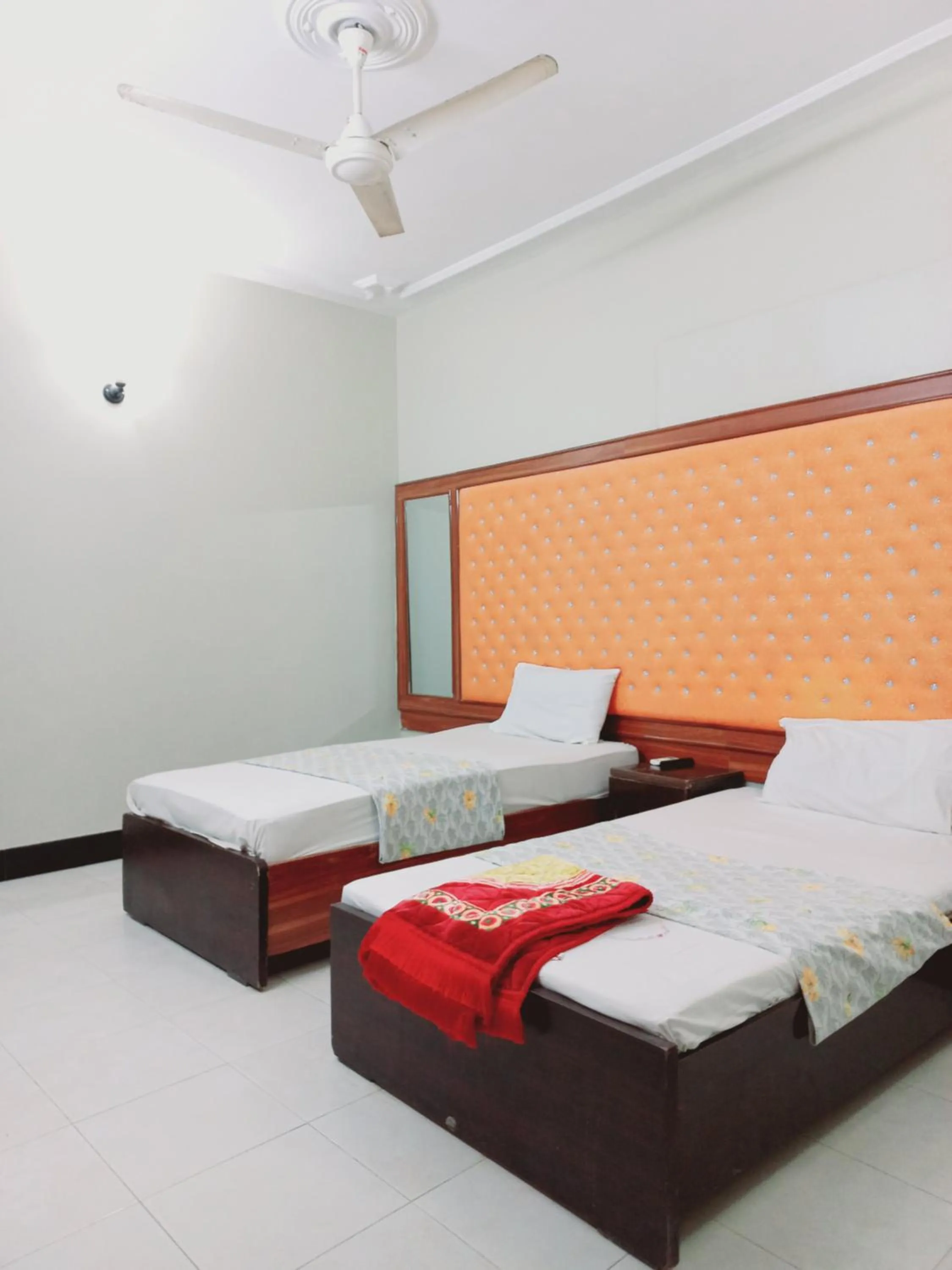 Bed in Rose Palace Guest House