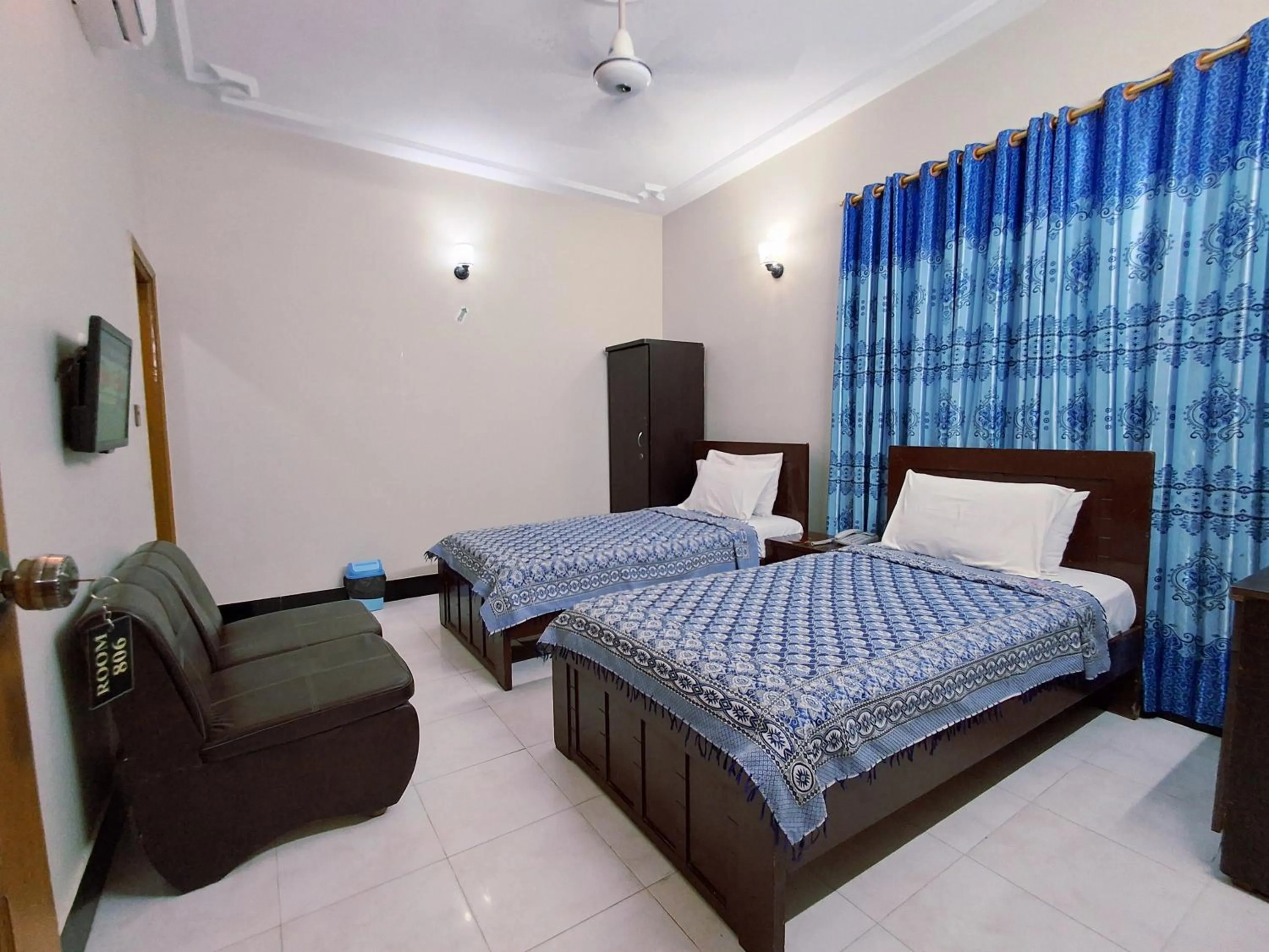 Bed in Rose Palace Guest House