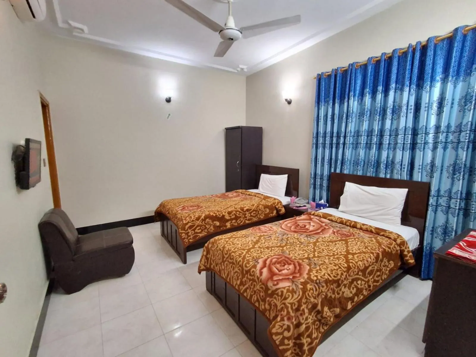 Bed in Rose Palace Guest House