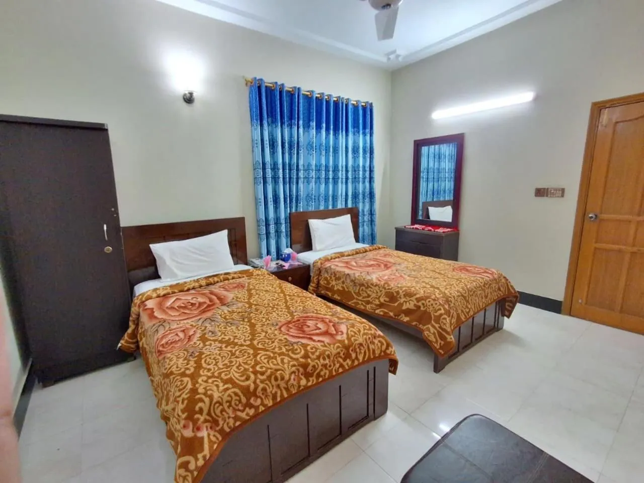 Bed in Rose Palace Guest House