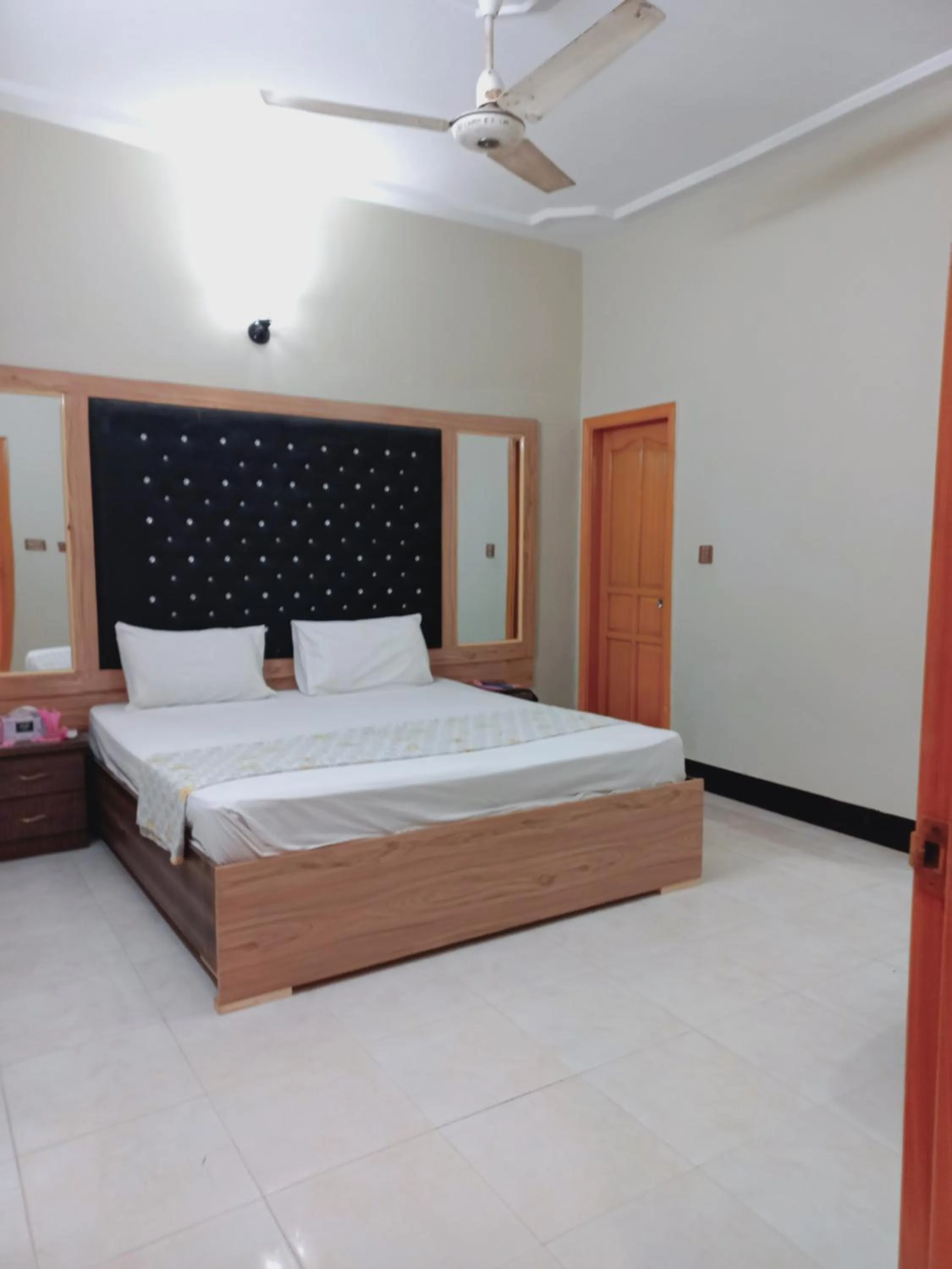 Bed in Rose Palace Guest House