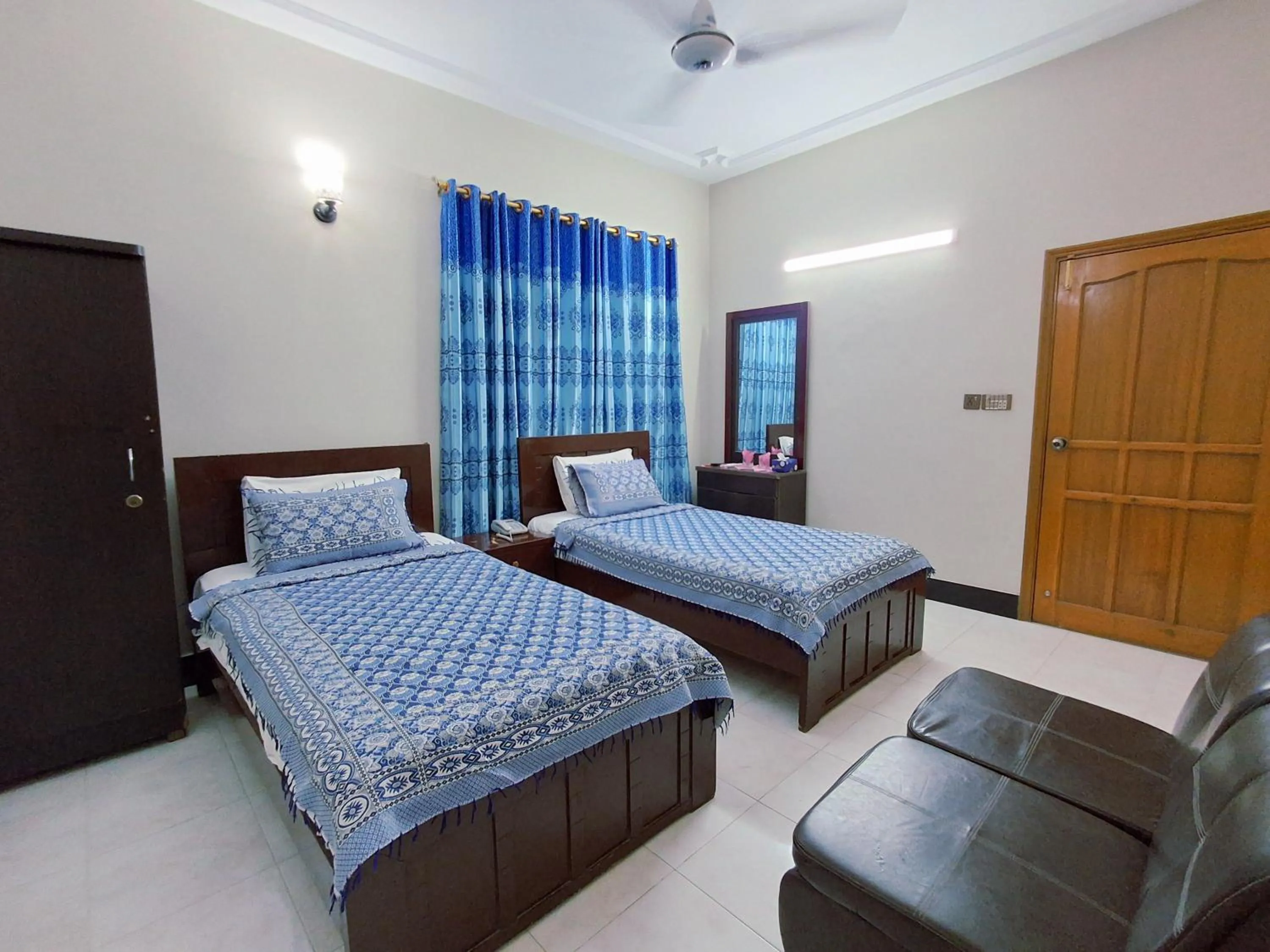 Bed in Rose Palace Guest House