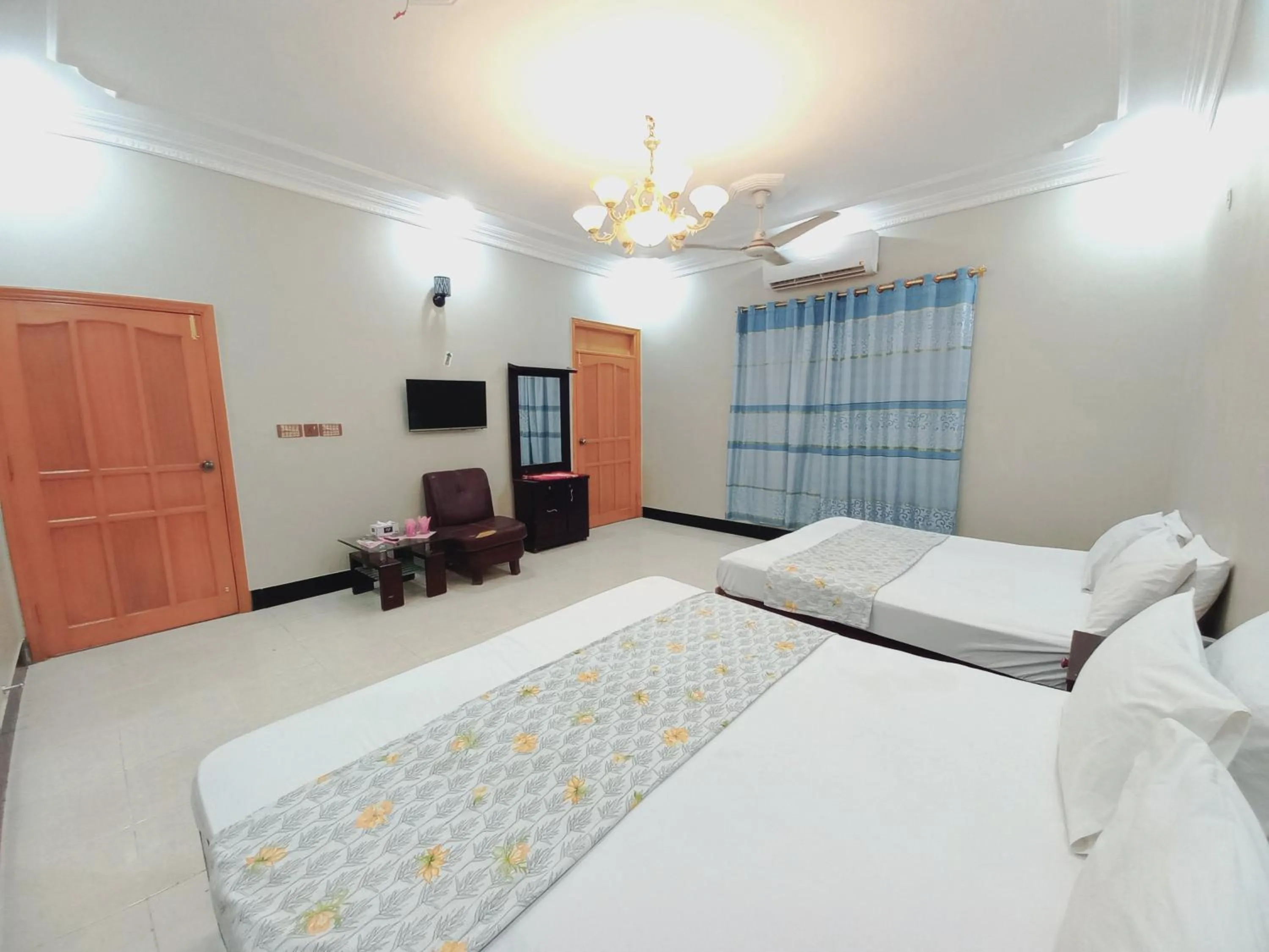 Bed in Rose Palace Guest House