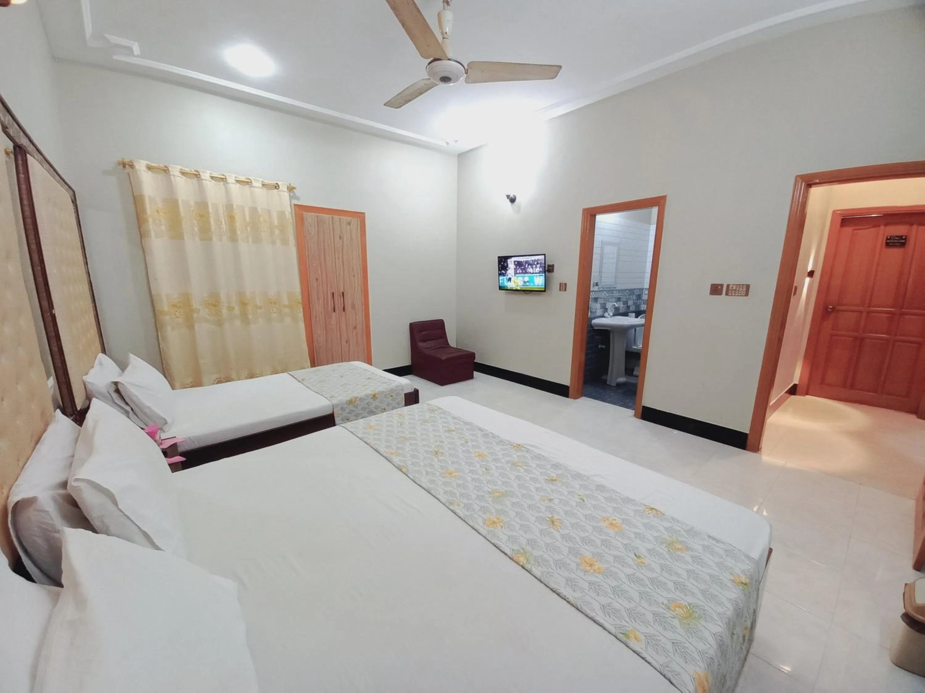 Bed in Rose Palace Guest House