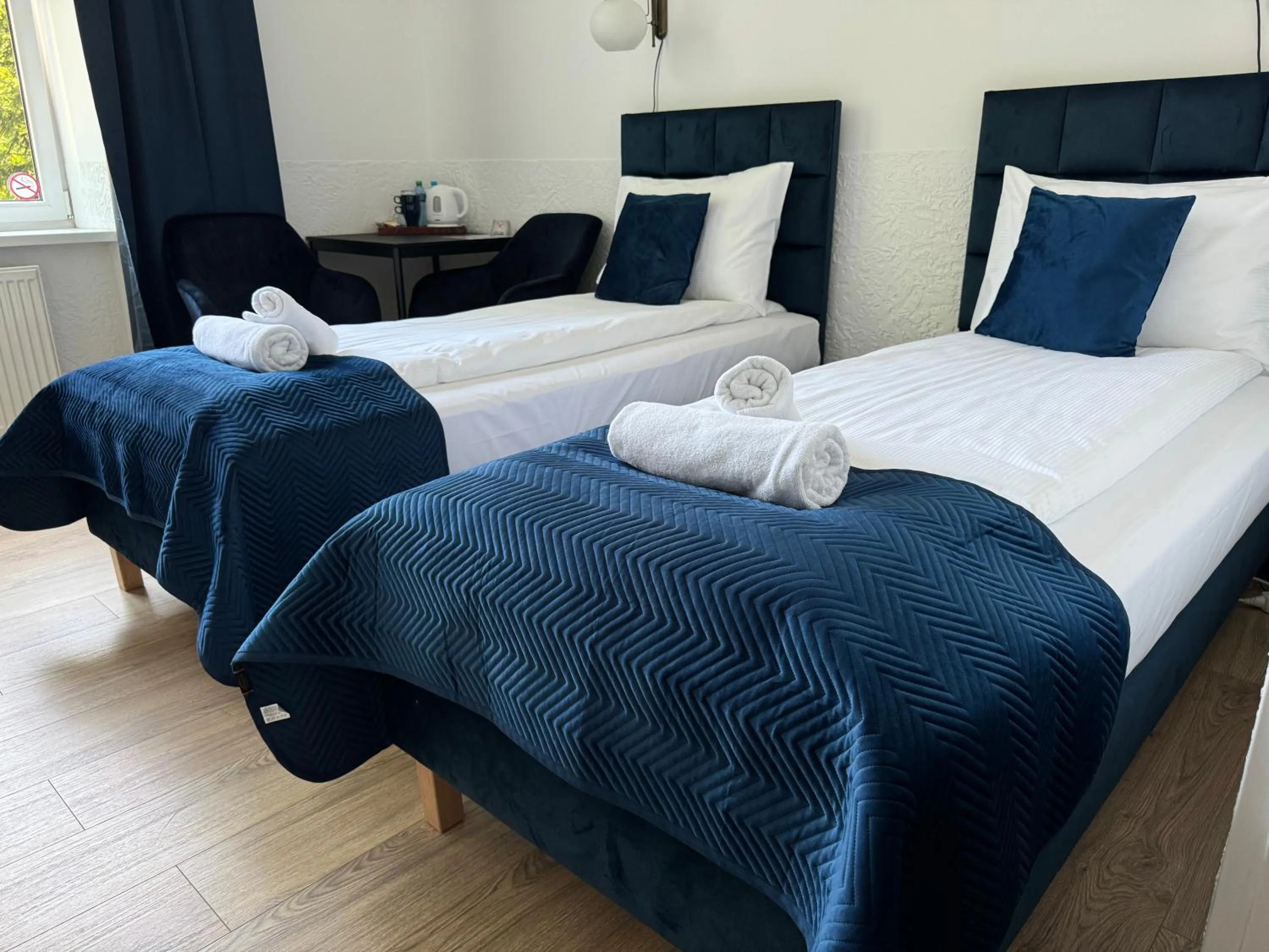 Bed in IRIS Aparthotel