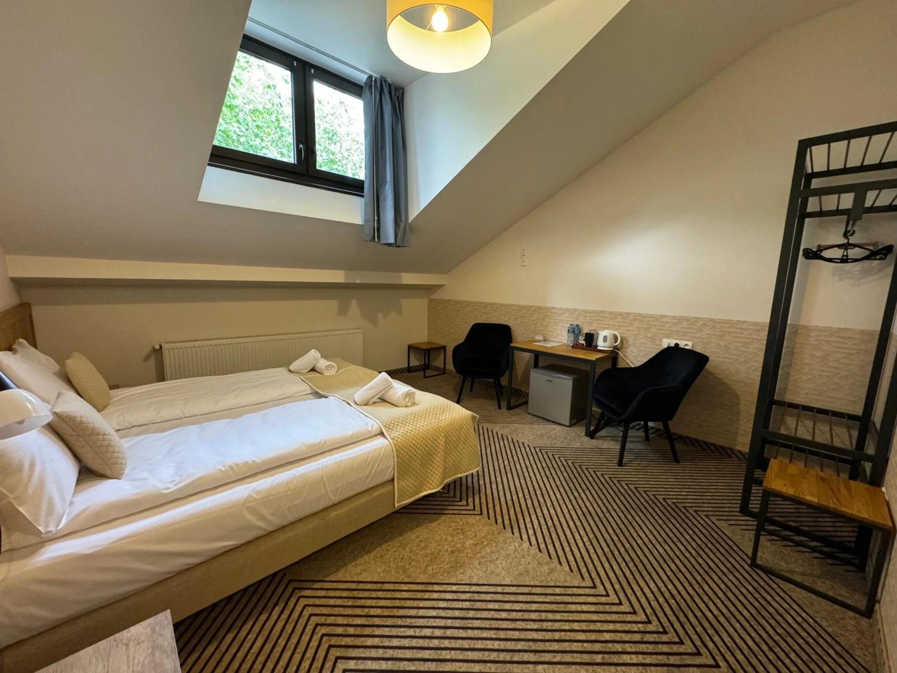 Bed in IRIS Aparthotel