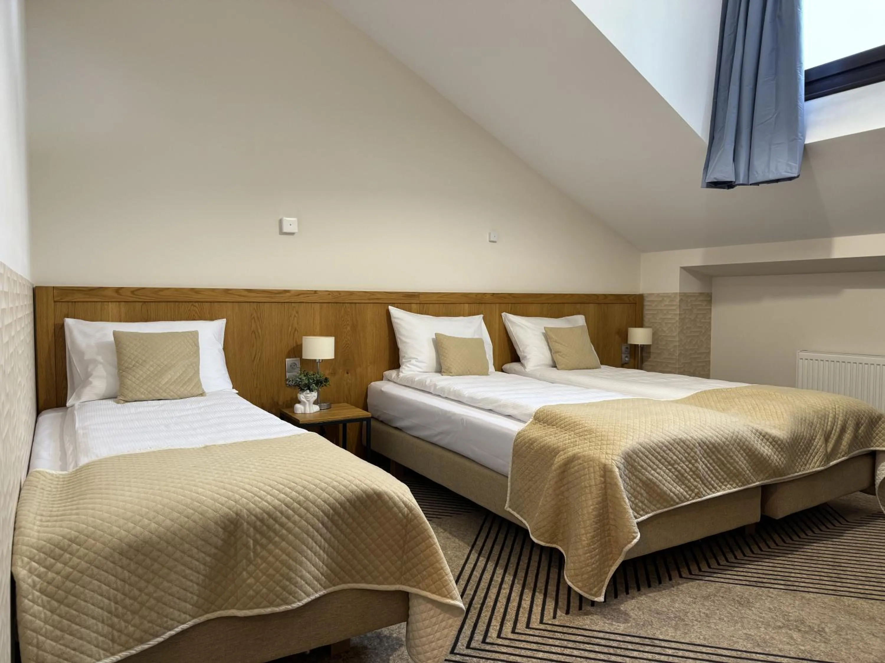 Bed in IRIS Aparthotel