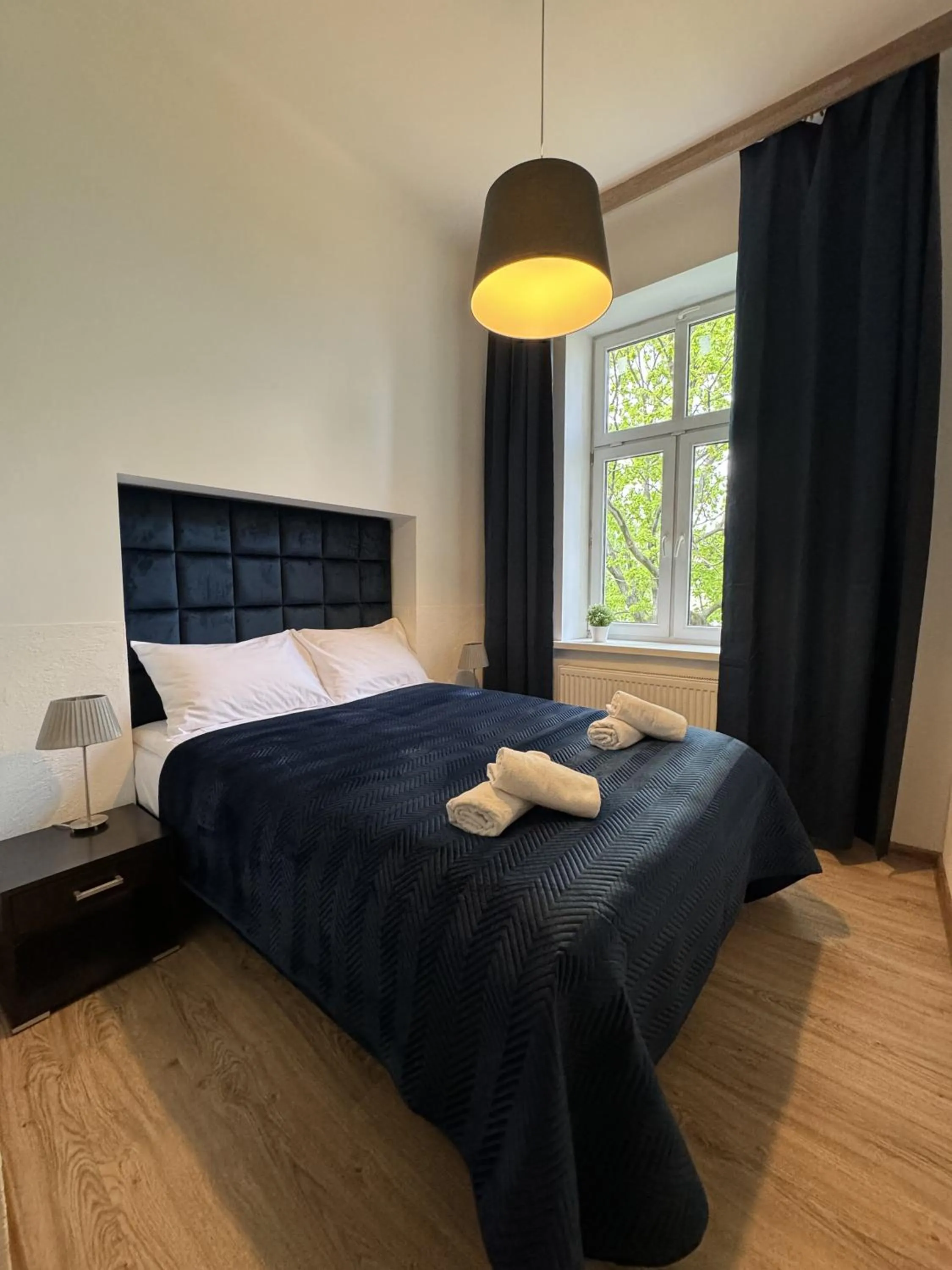 Bed in IRIS Aparthotel