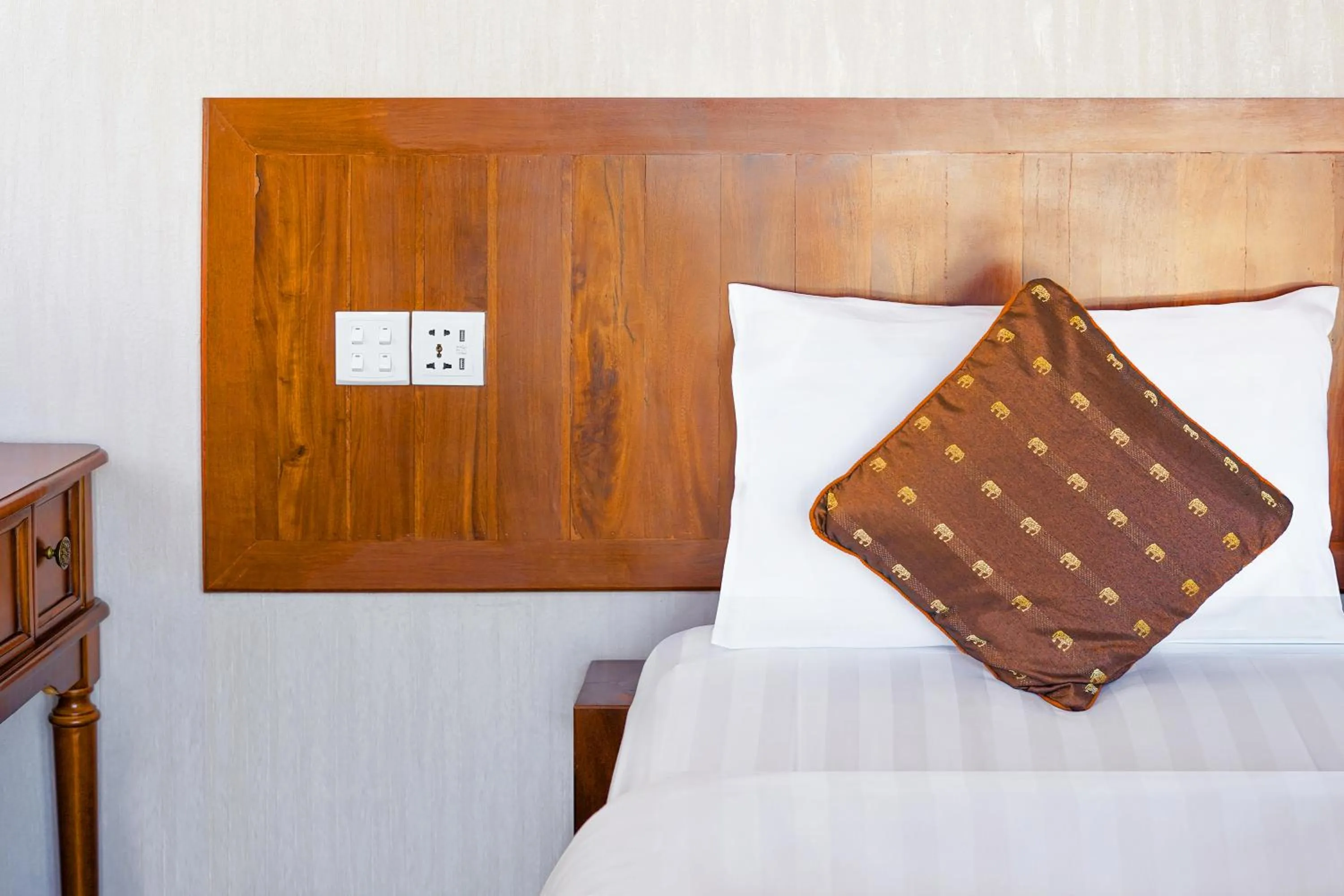 Bed in Phuminh Hotel Riverside