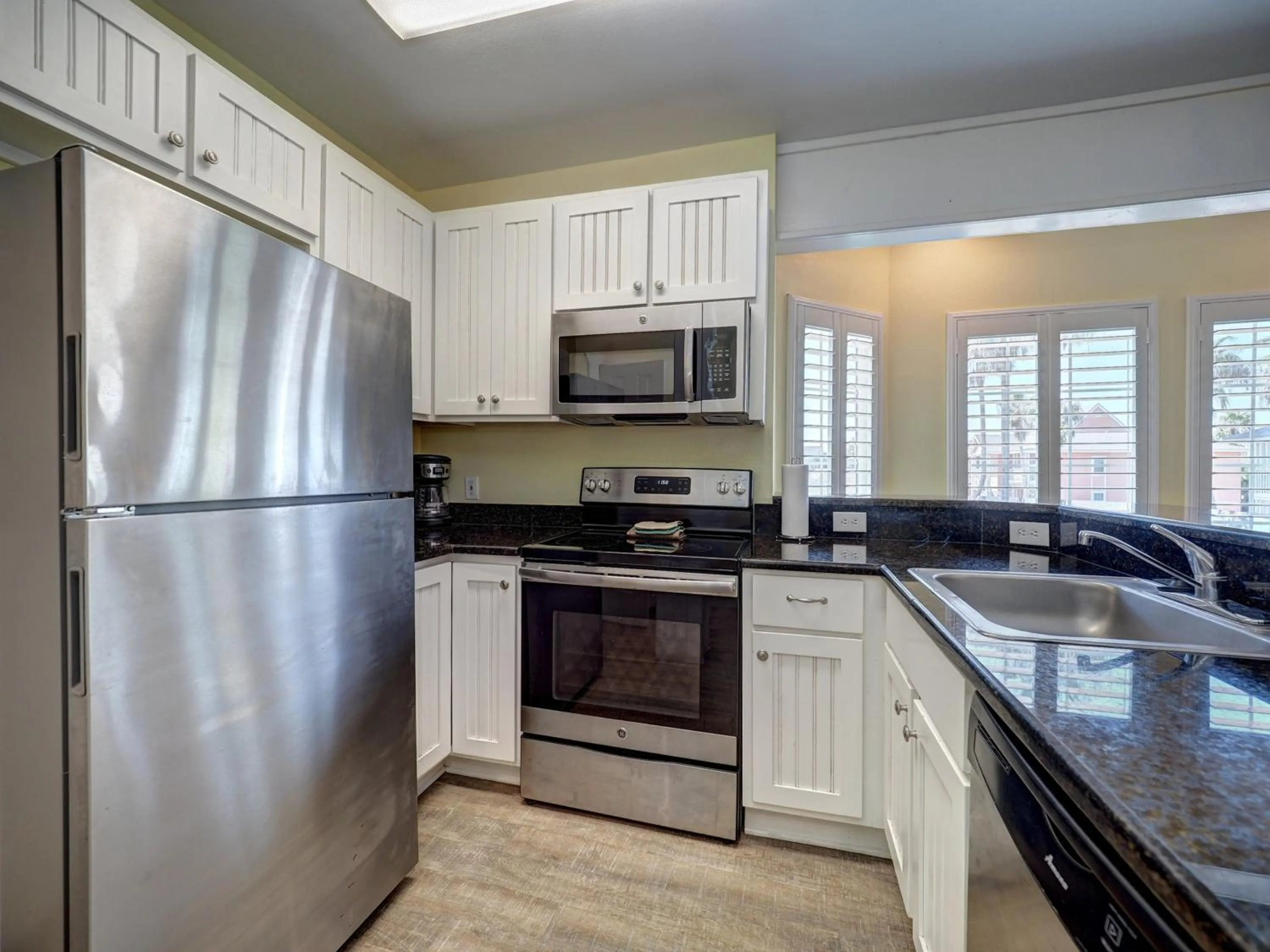Kitchen or kitchenette in Seashell Village Resort near the beach with kitchens