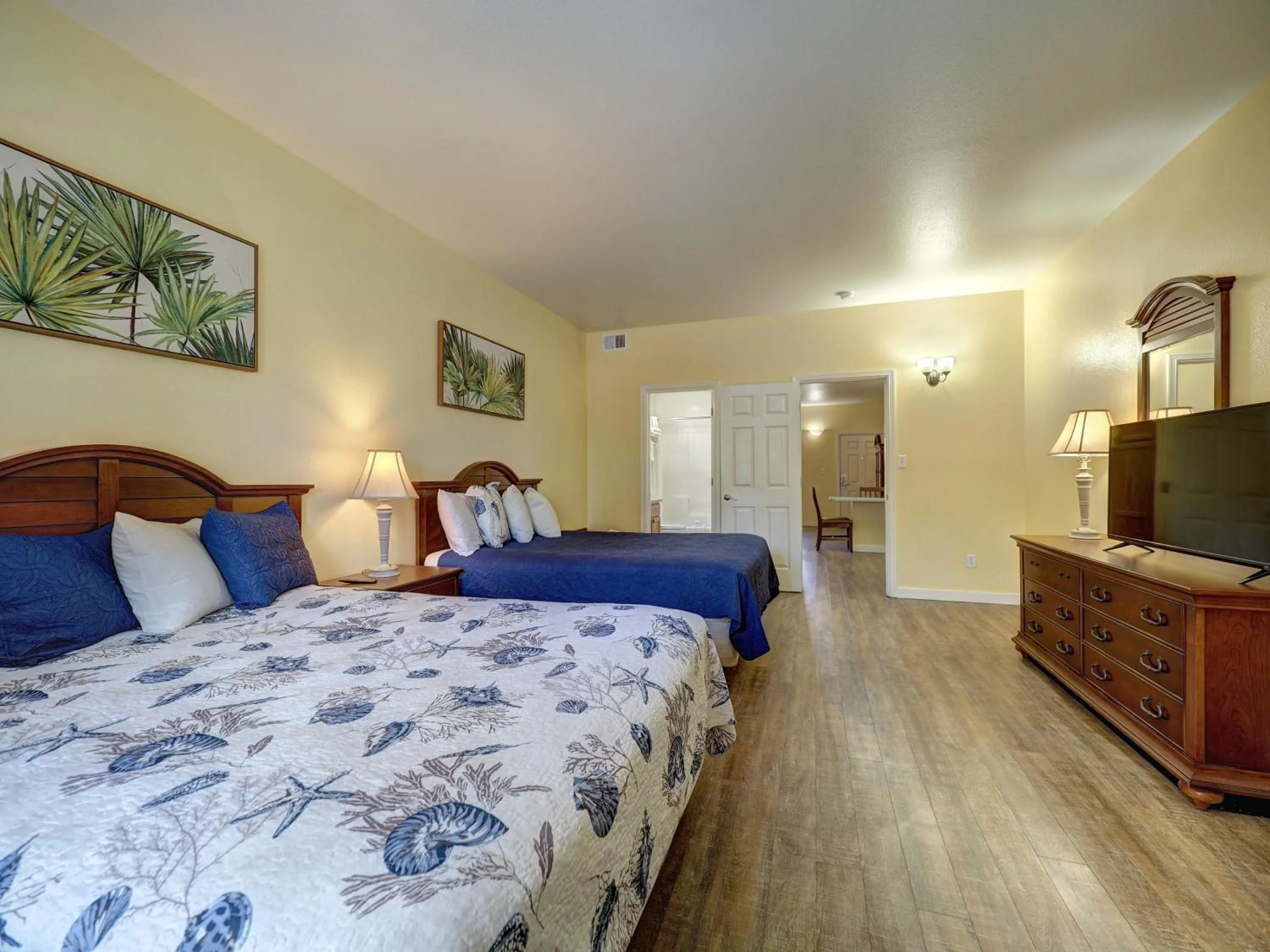 Bed in Seashell Village Resort near the beach with kitchens