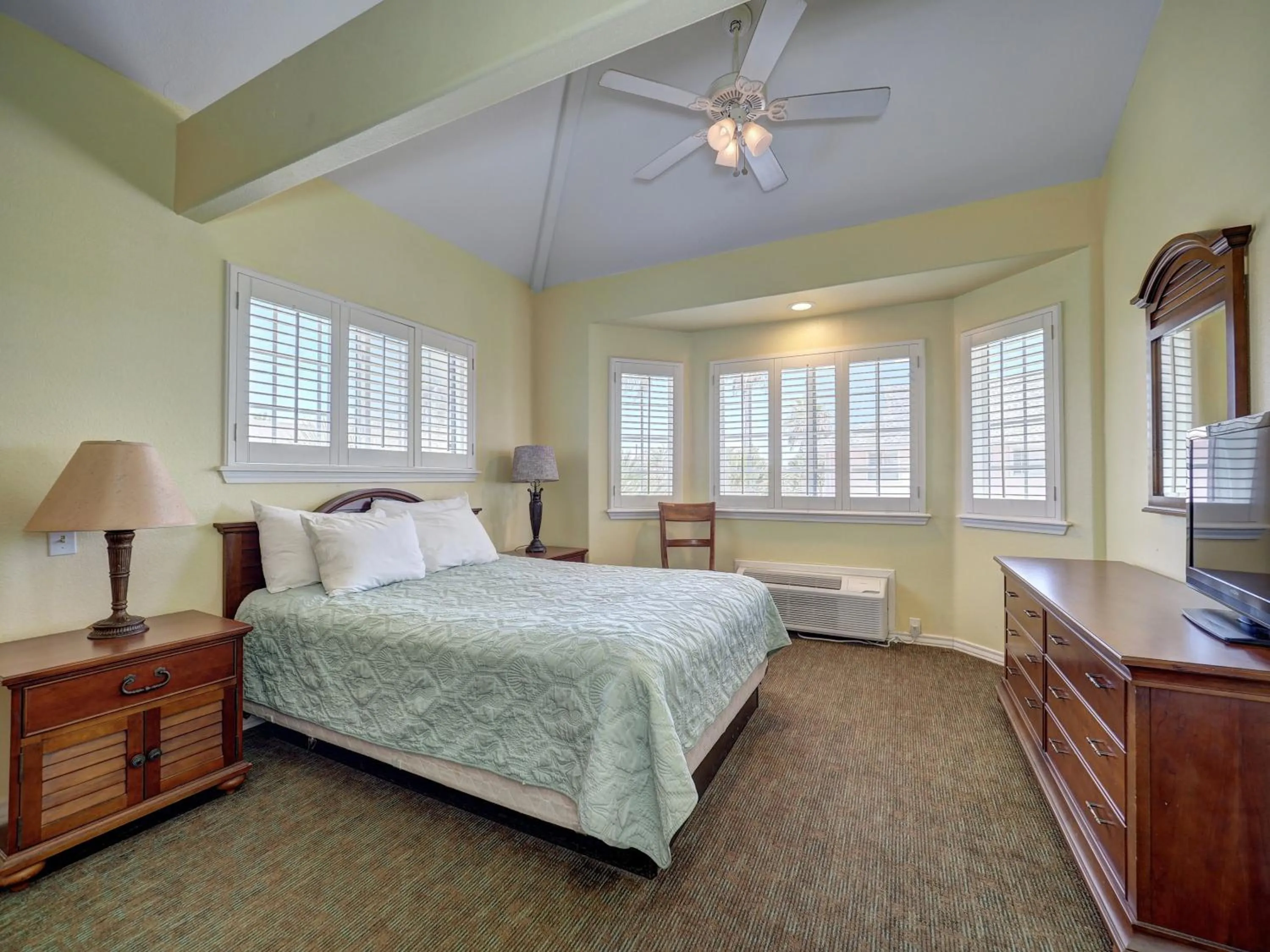 Bed in Seashell Village Resort near the beach with kitchens