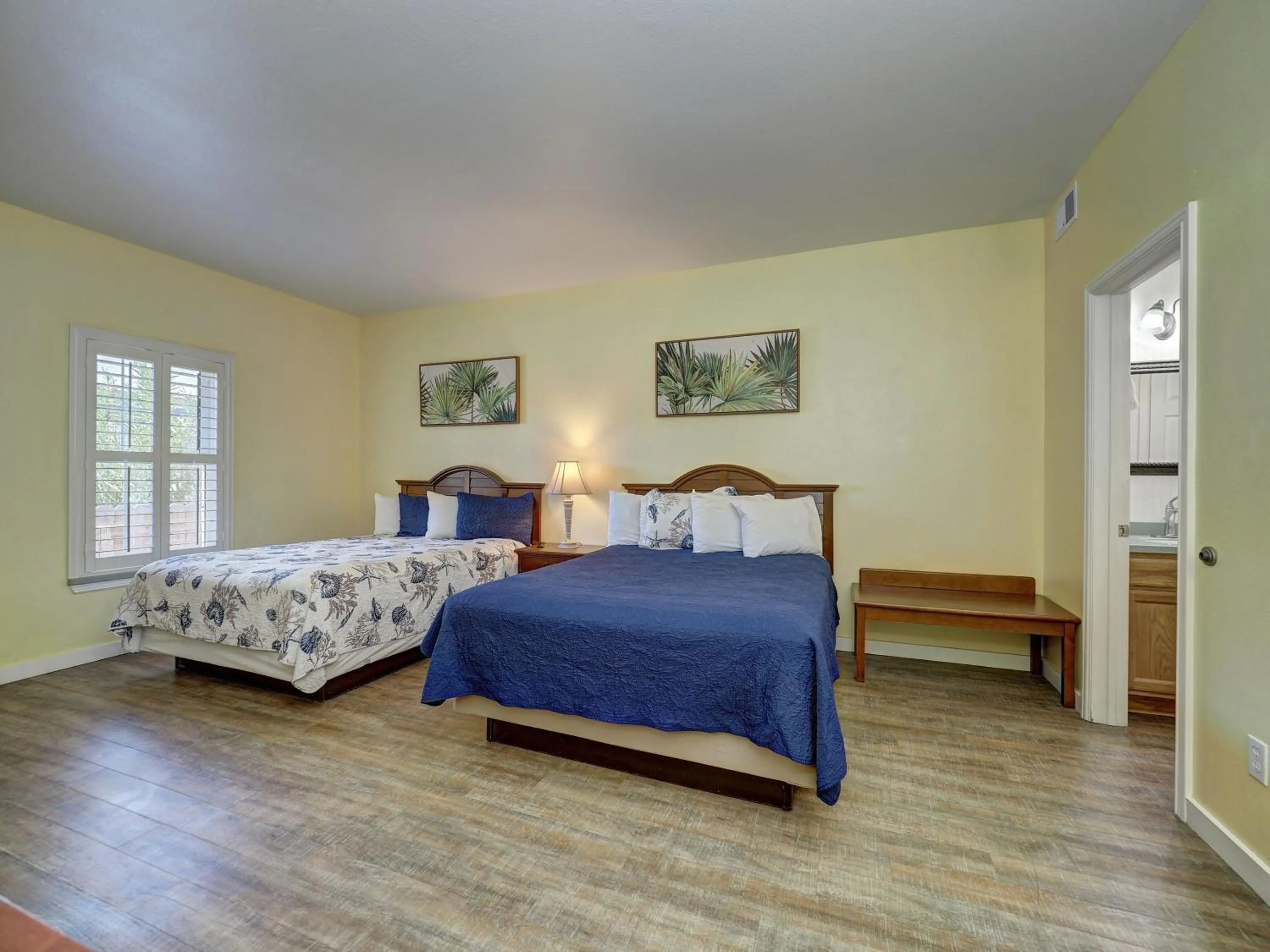 Bed in Seashell Village Resort near the beach with kitchens