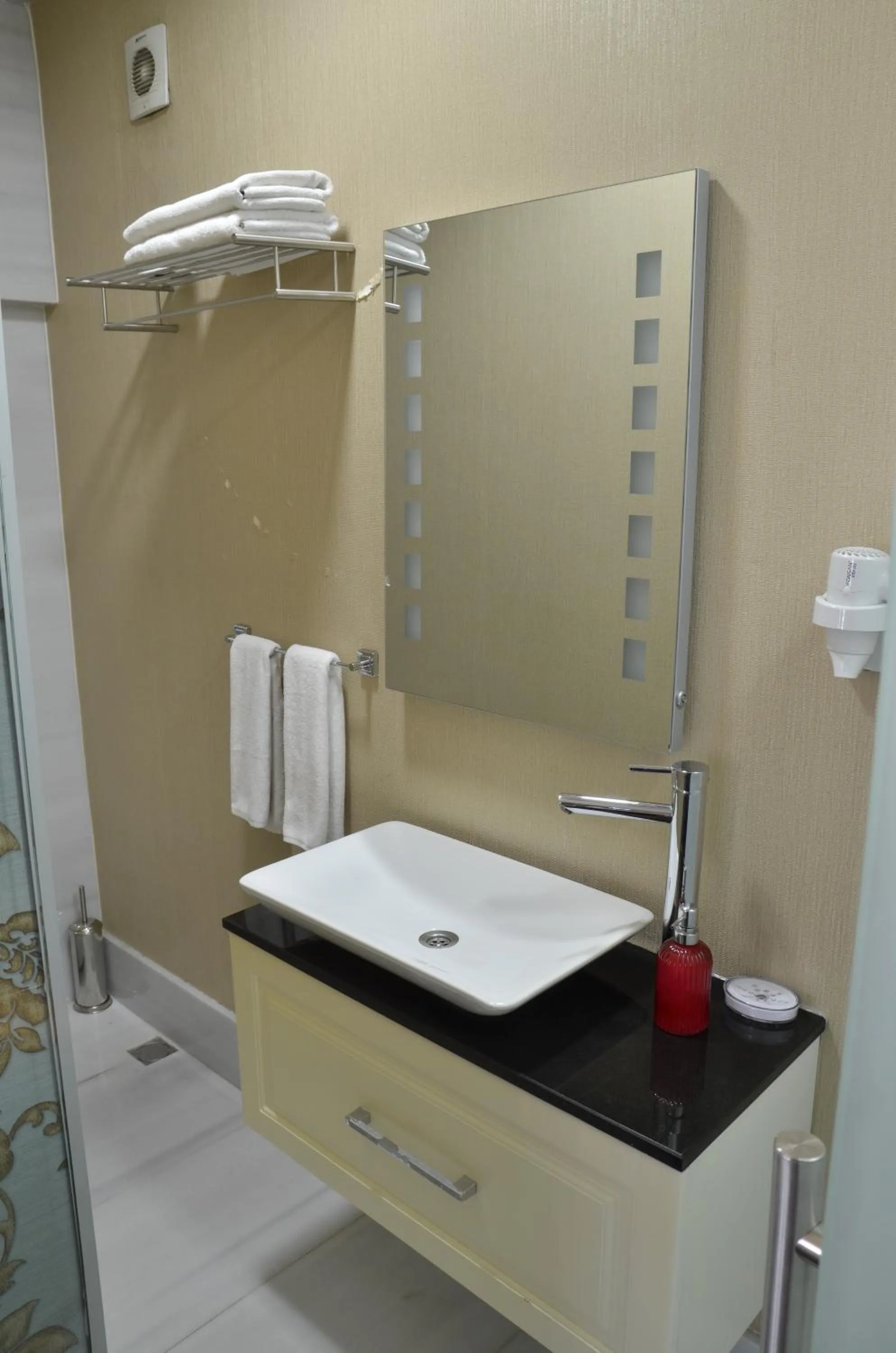 Toilet in Miller Hotel