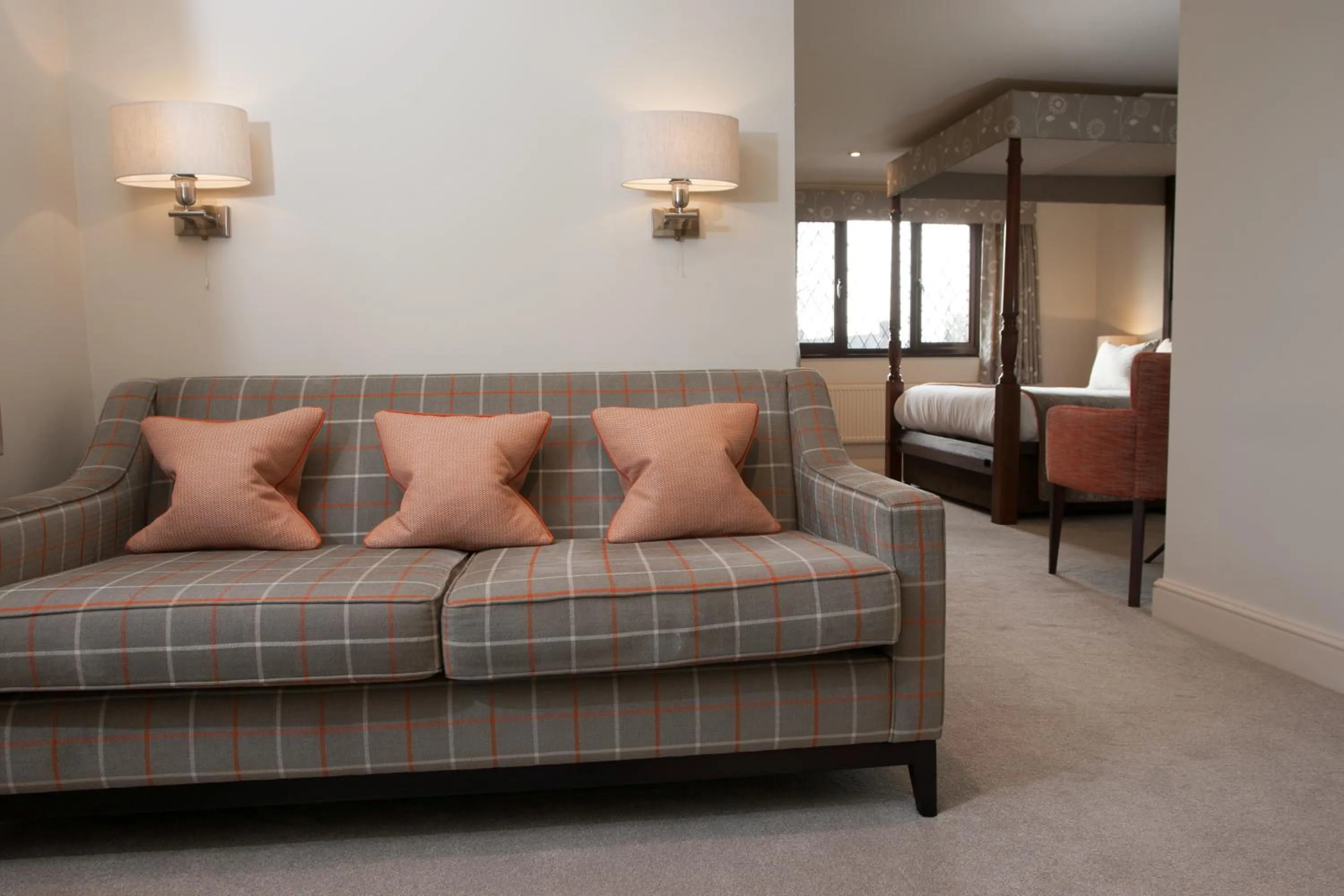 Seating area, Bed in Stirrups Hotel