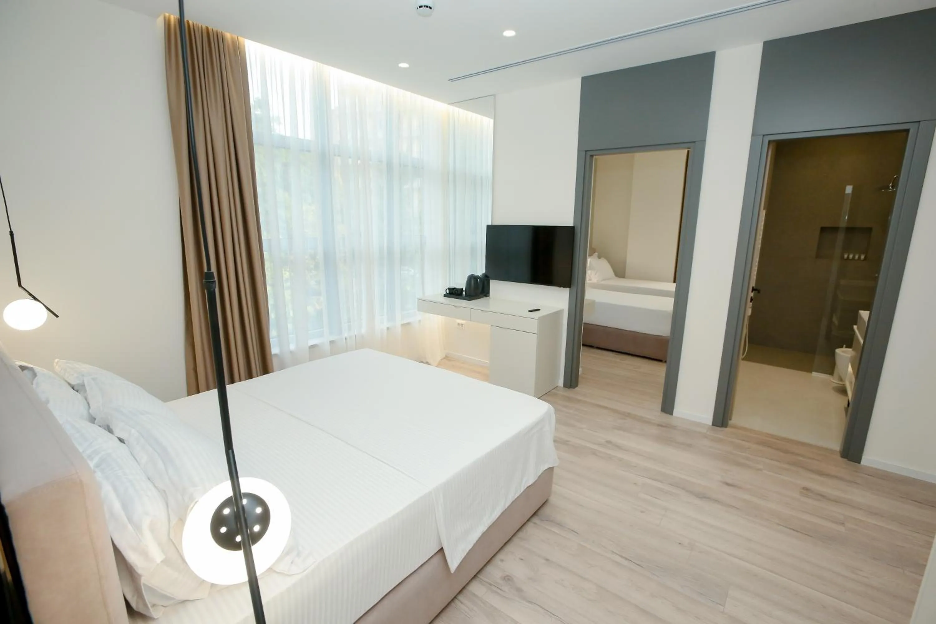 Bed in NÓS Luxury Rooms Shkoder