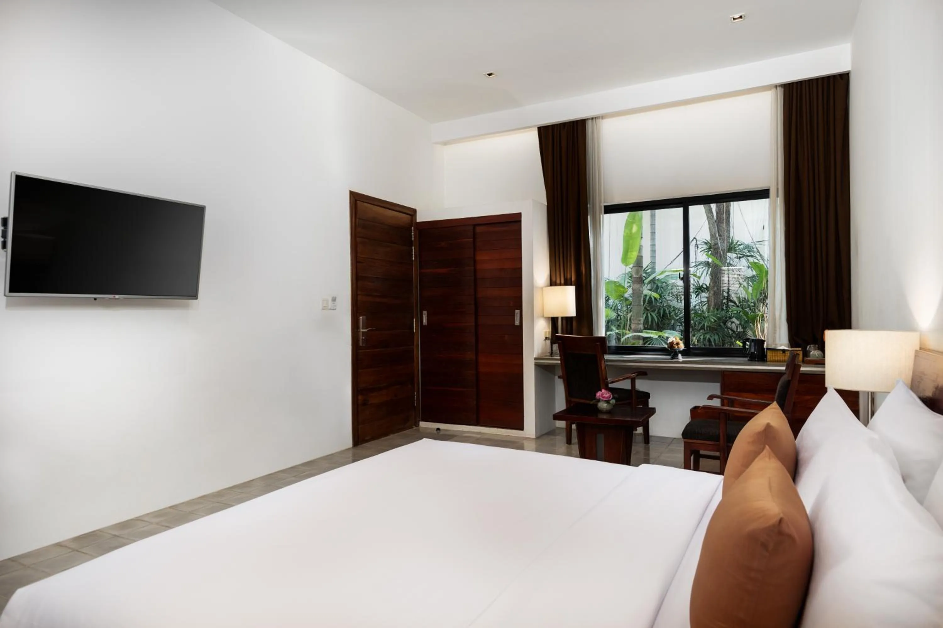 Bed in Lynnaya Urban River Resort