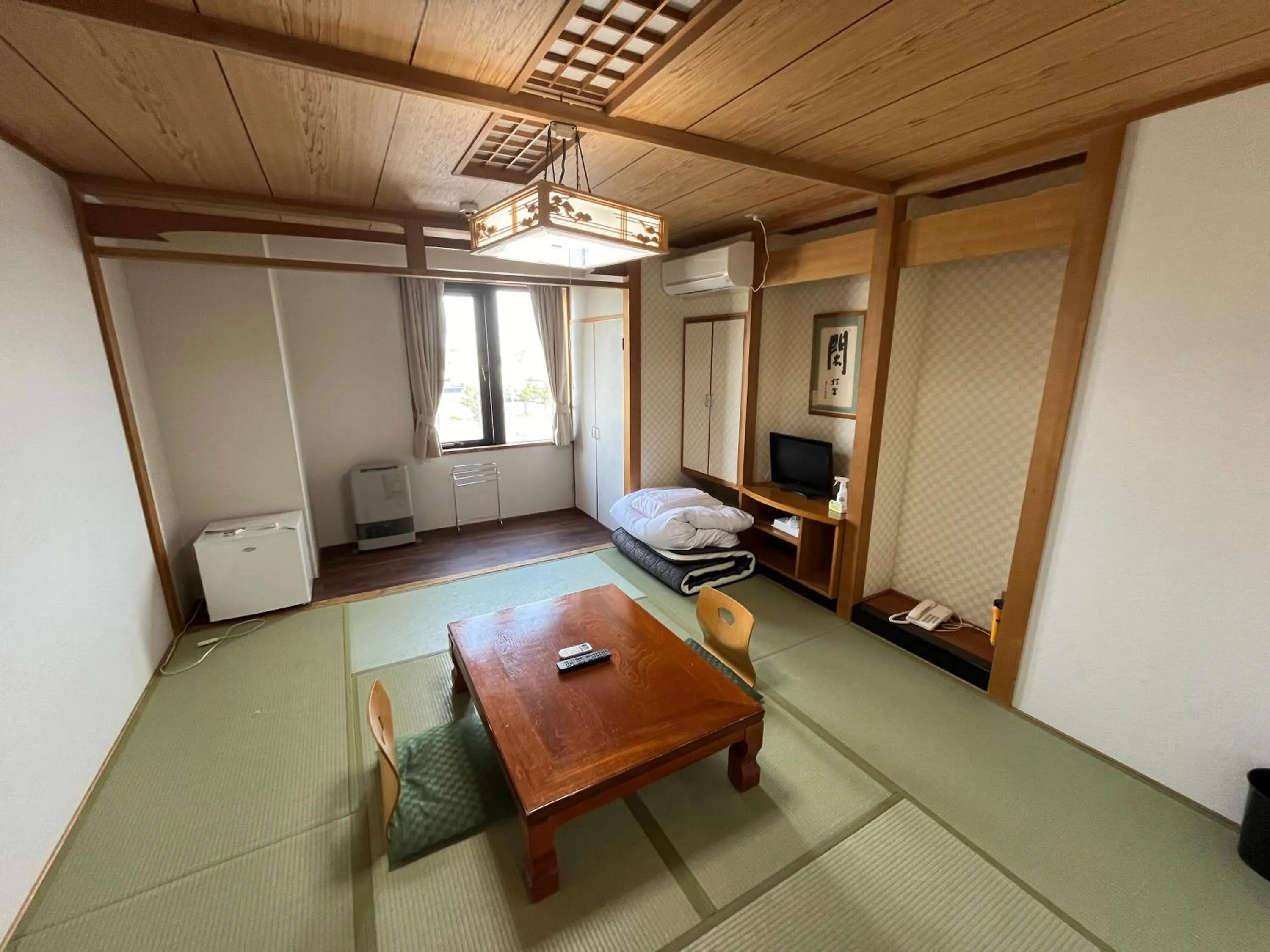 Living room, Bed in Hotel Marsh Land