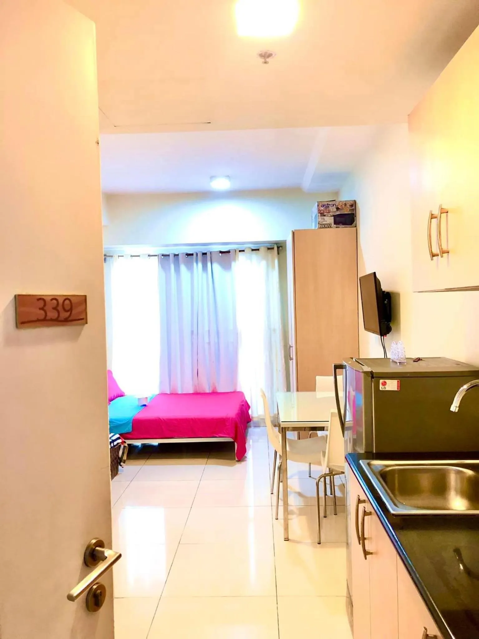 Photo of the whole room, Bed in JT Tagaytay Suites