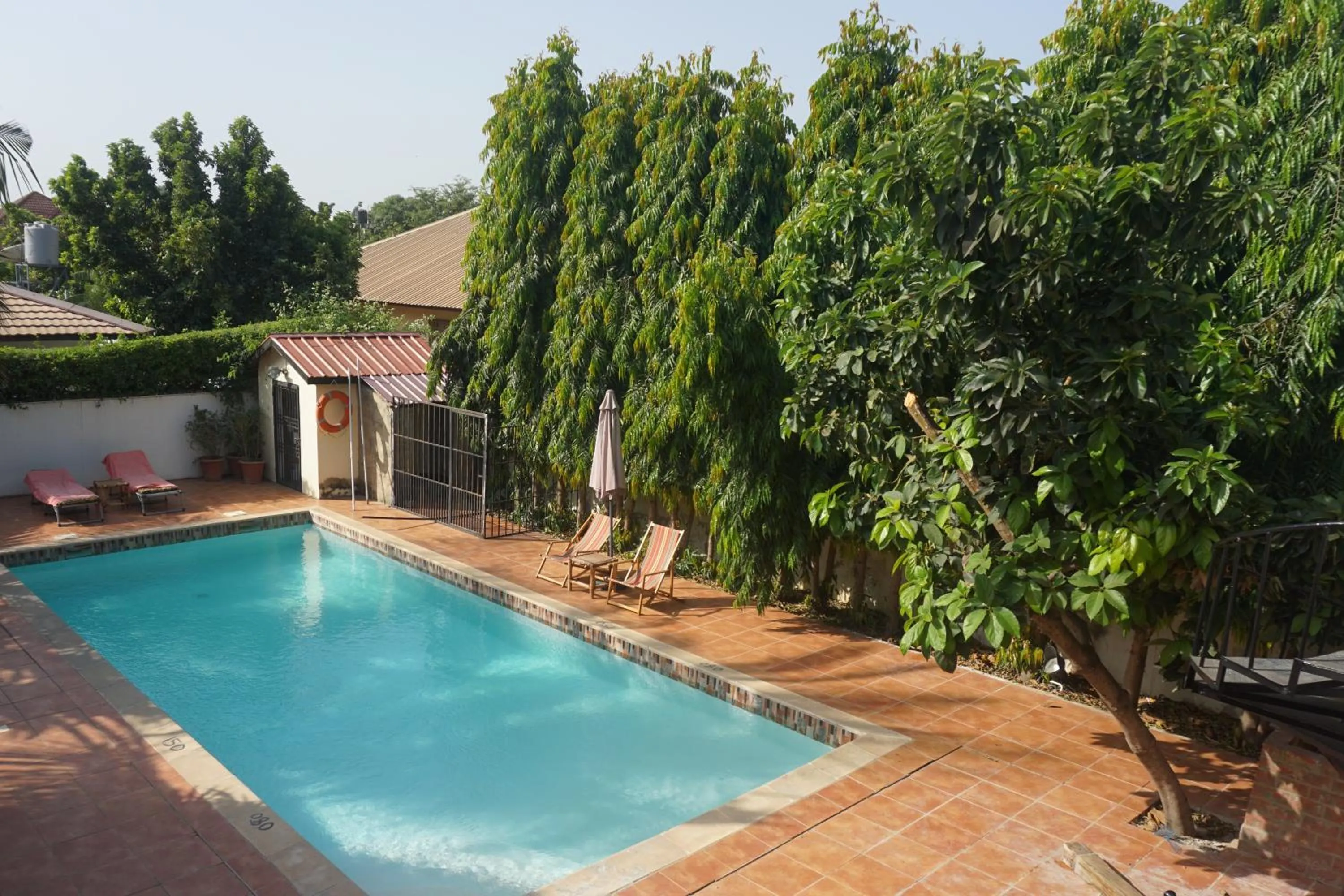 Pool view in B & B Villa Calliandra