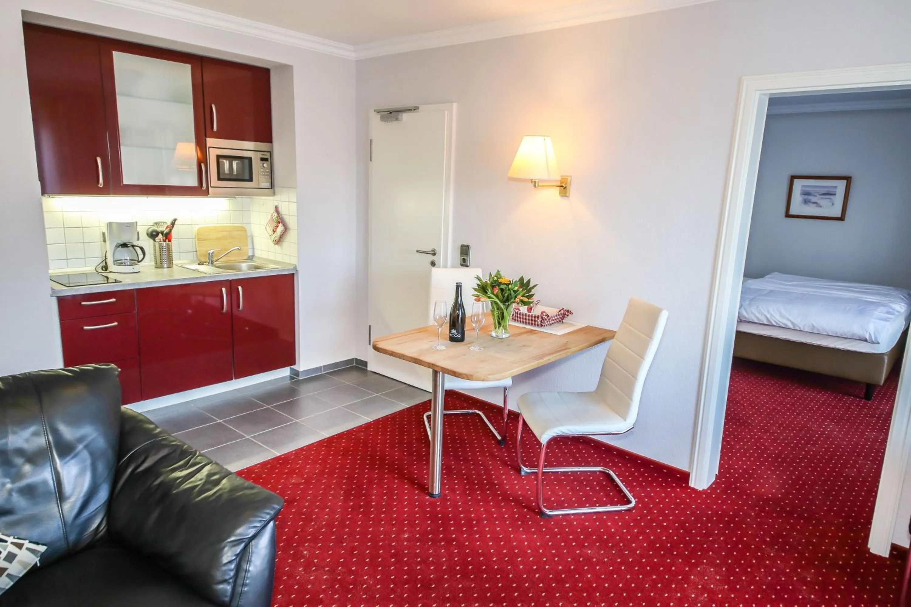 Kitchen or kitchenette, Bed in 3C-Appartements