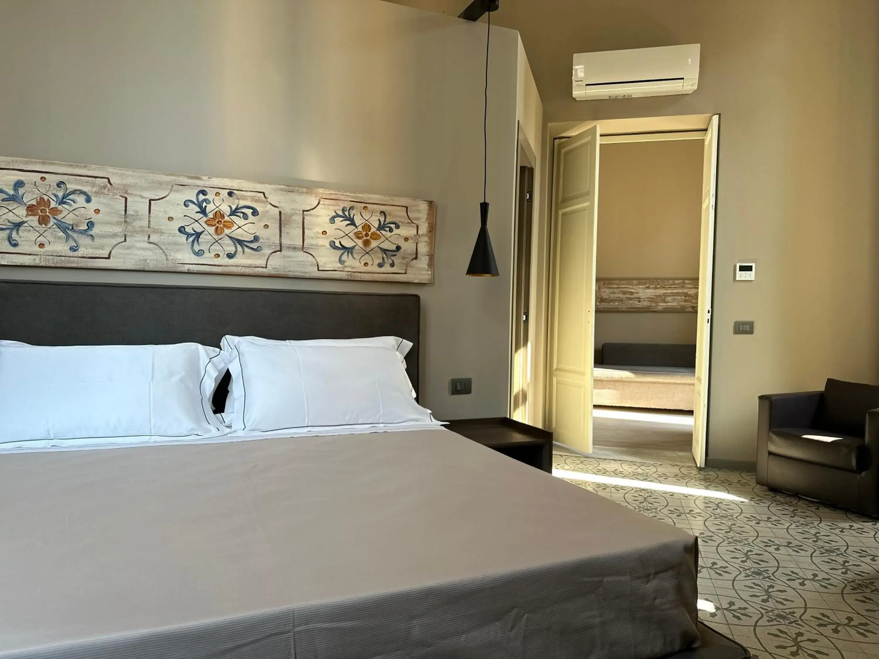 Photo of the whole room, Bed in Palazzo Liberty Unique Hotel by Geocharme Photo of the whole room, Bed in Palazzo Liberty Unique Hotel by Geocharme