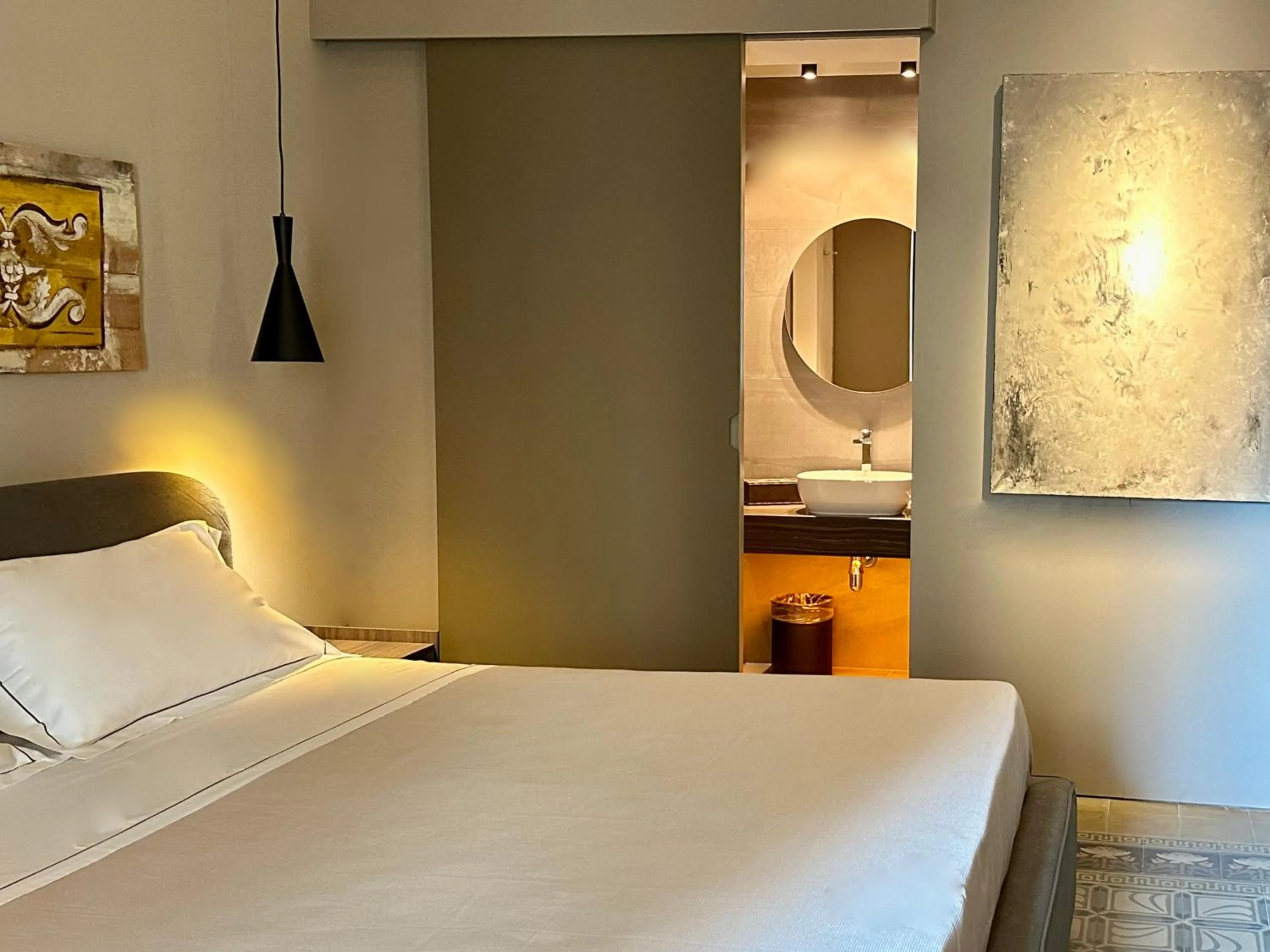 Bathroom, Bed in Palazzo Liberty Unique Hotel by Geocharme