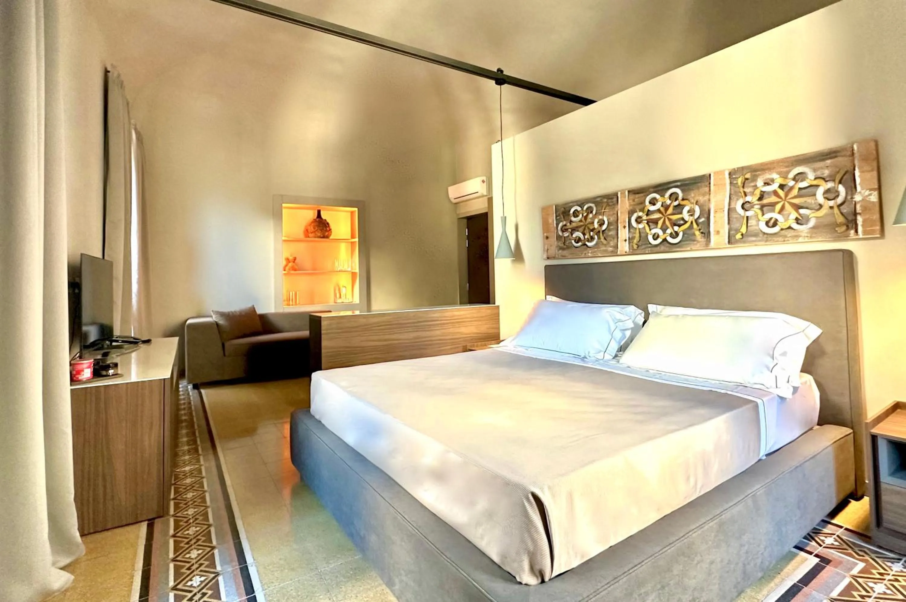 Photo of the whole room, Bed in Palazzo Liberty Unique Hotel by Geocharme