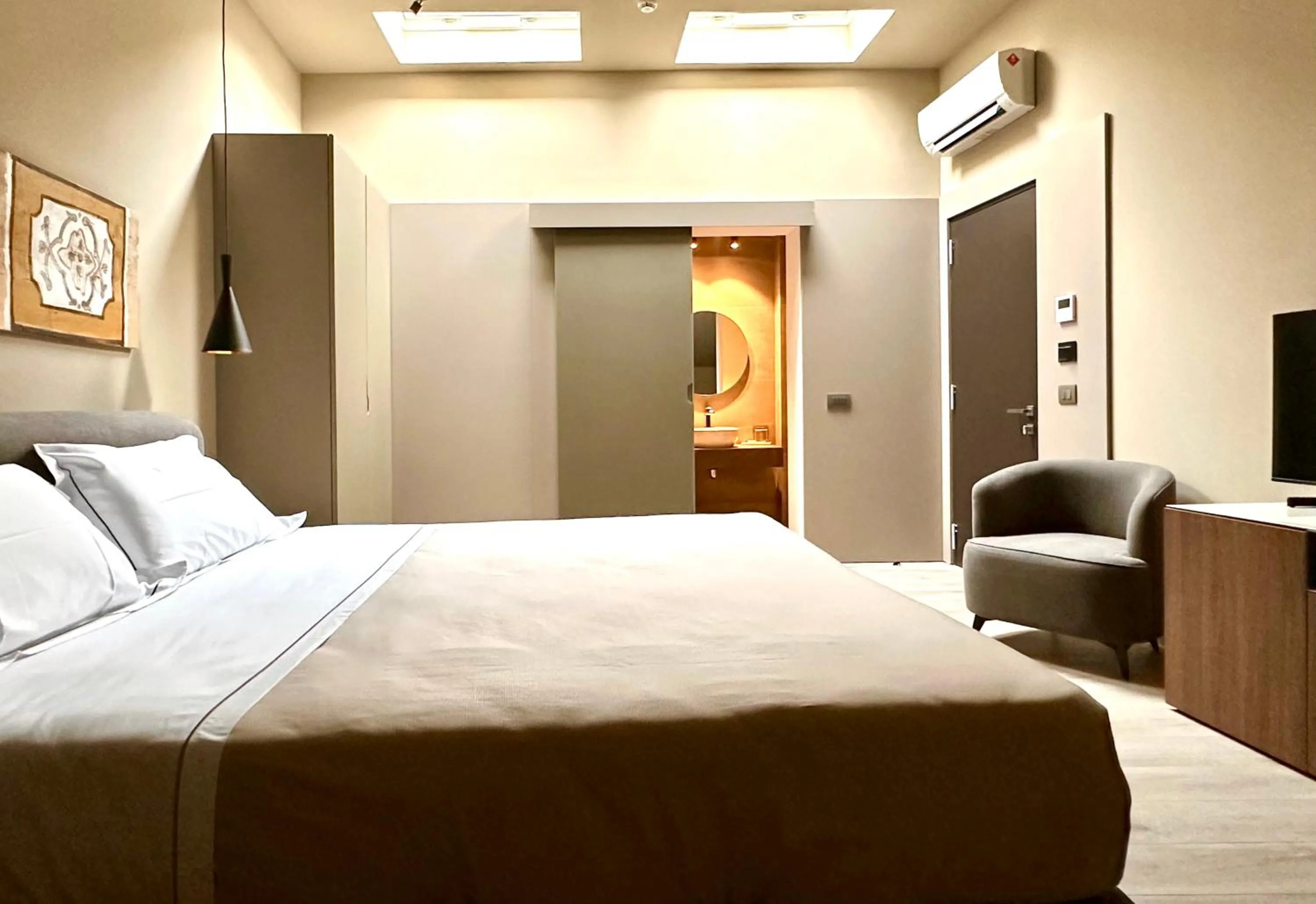 Photo of the whole room, Bed in Palazzo Liberty Unique Hotel by Geocharme