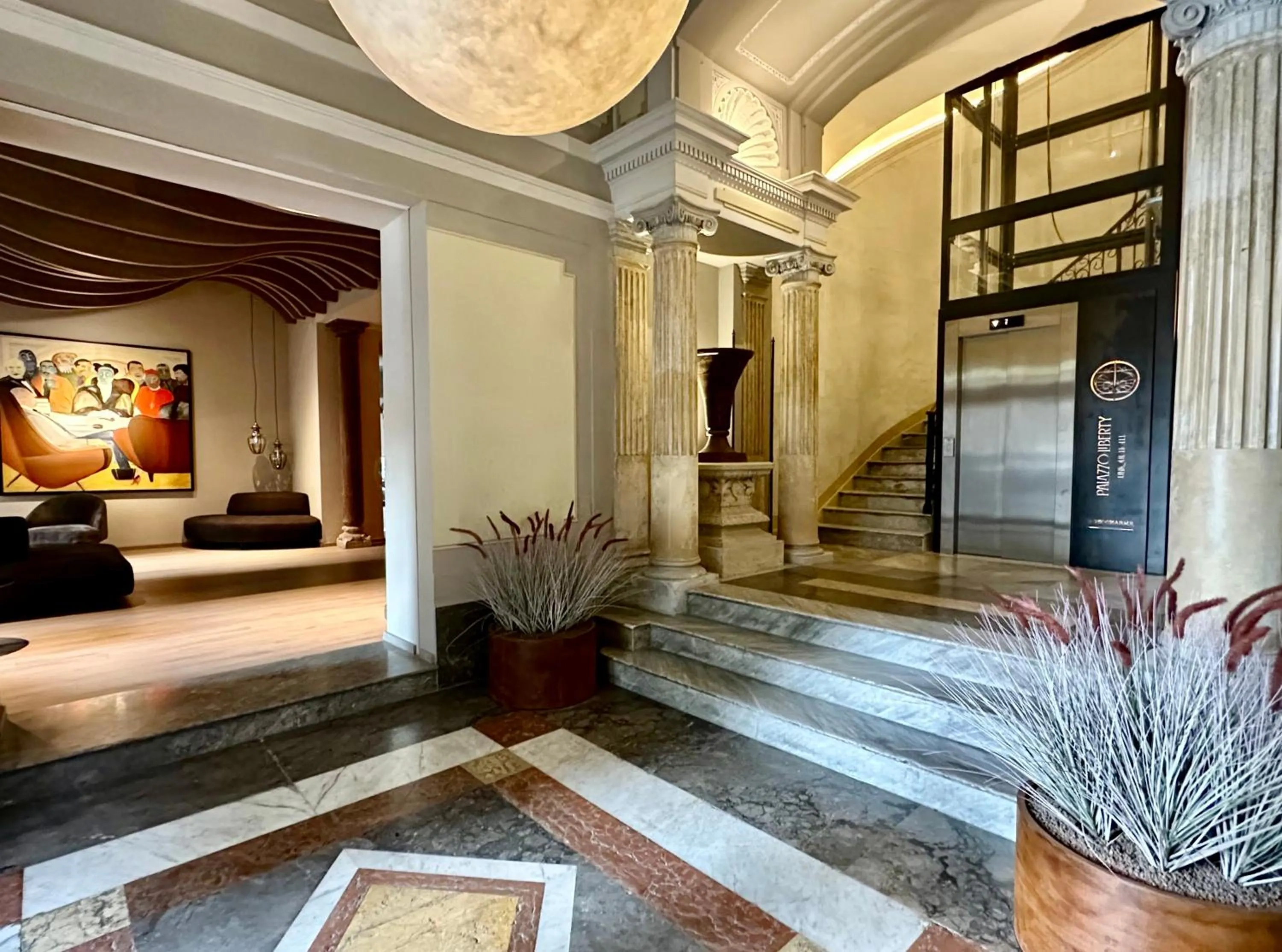 Lobby or reception in Palazzo Liberty Unique Hotel by Geocharme