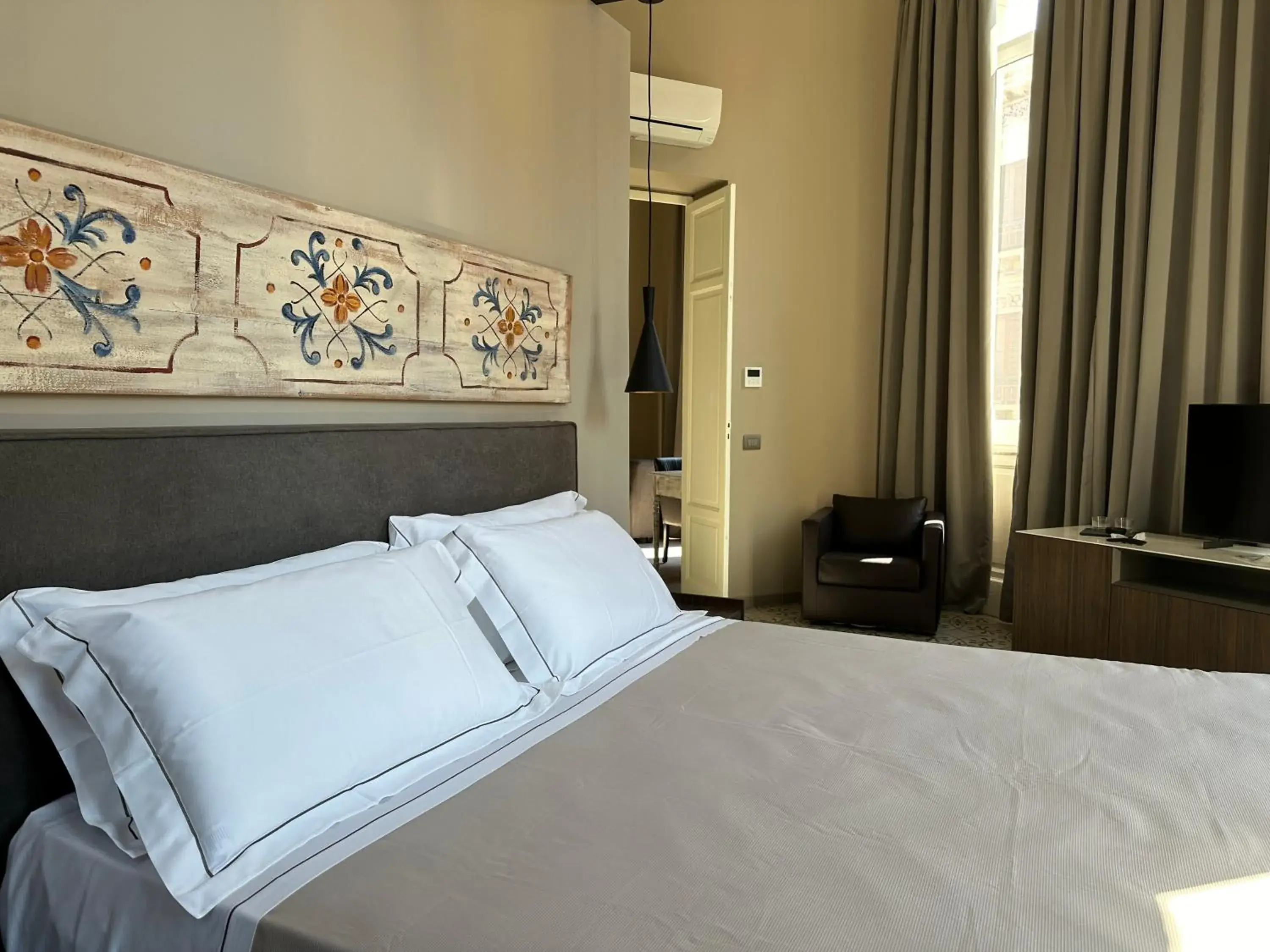 TV and multimedia, Bed in Palazzo Liberty Unique Hotel by Geocharme TV and multimedia, Bed in Palazzo Liberty Unique Hotel by Geocharme