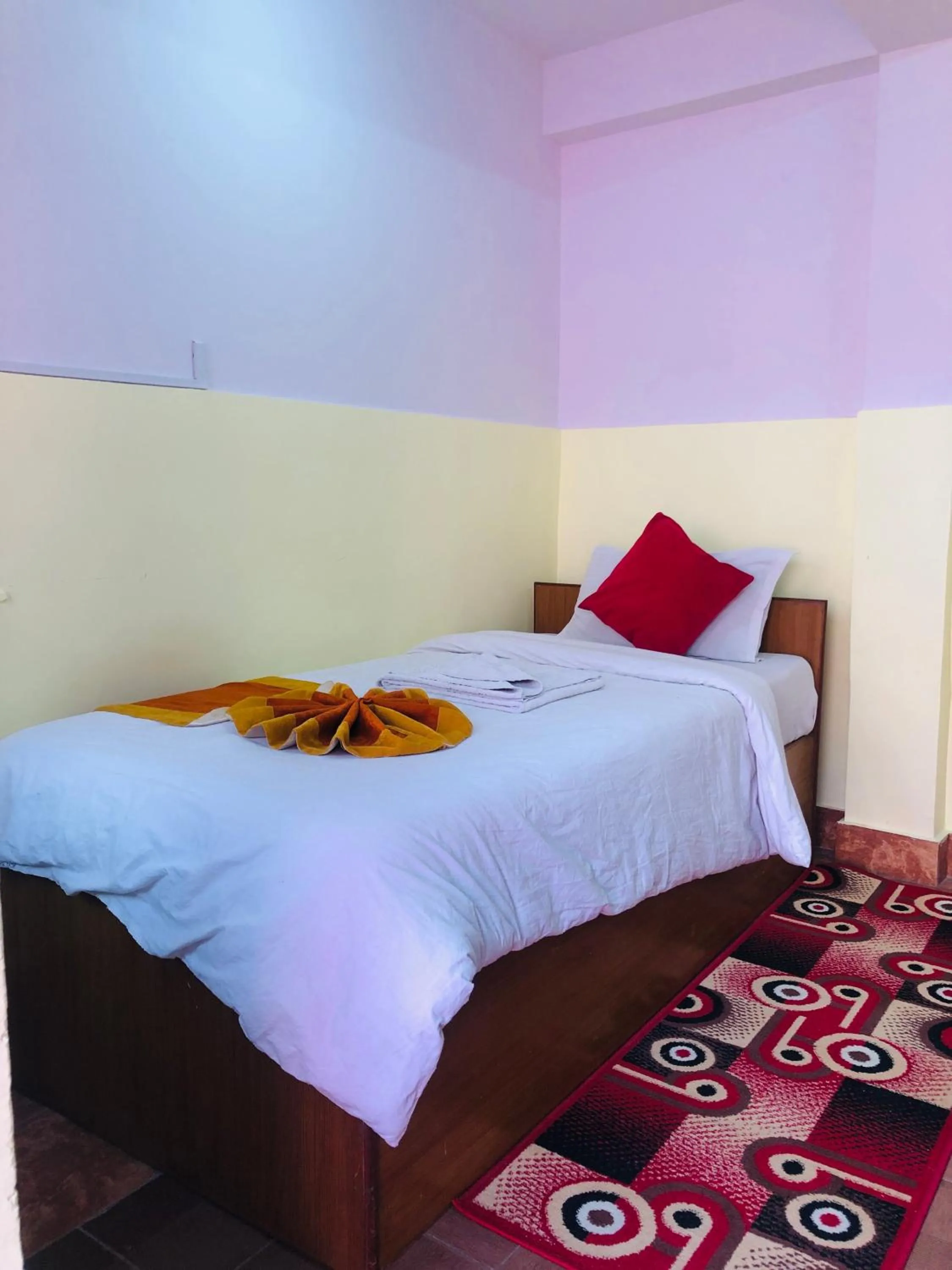 Bed in Yeti Cozy Hotel