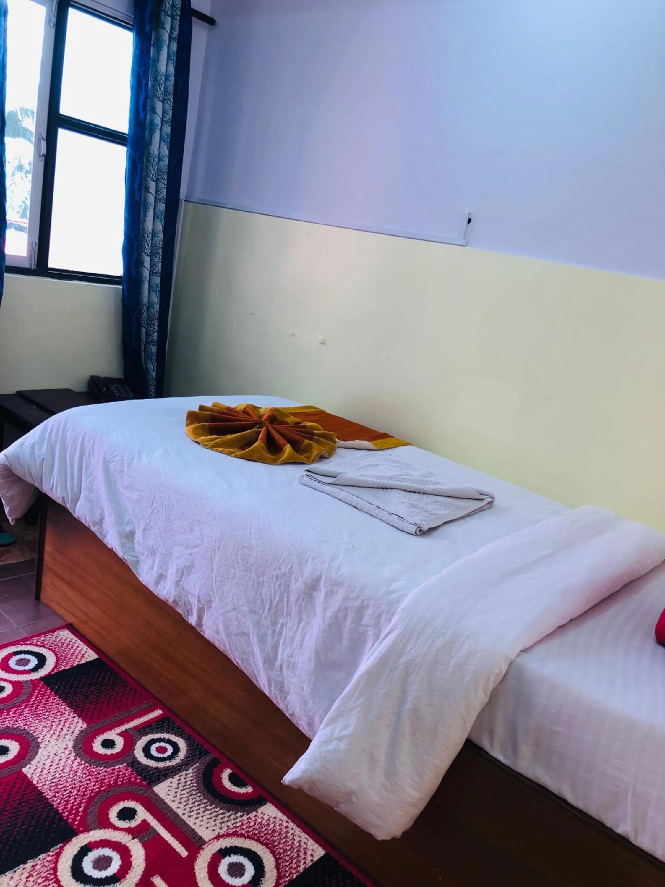 Bed in Yeti Cozy Hotel