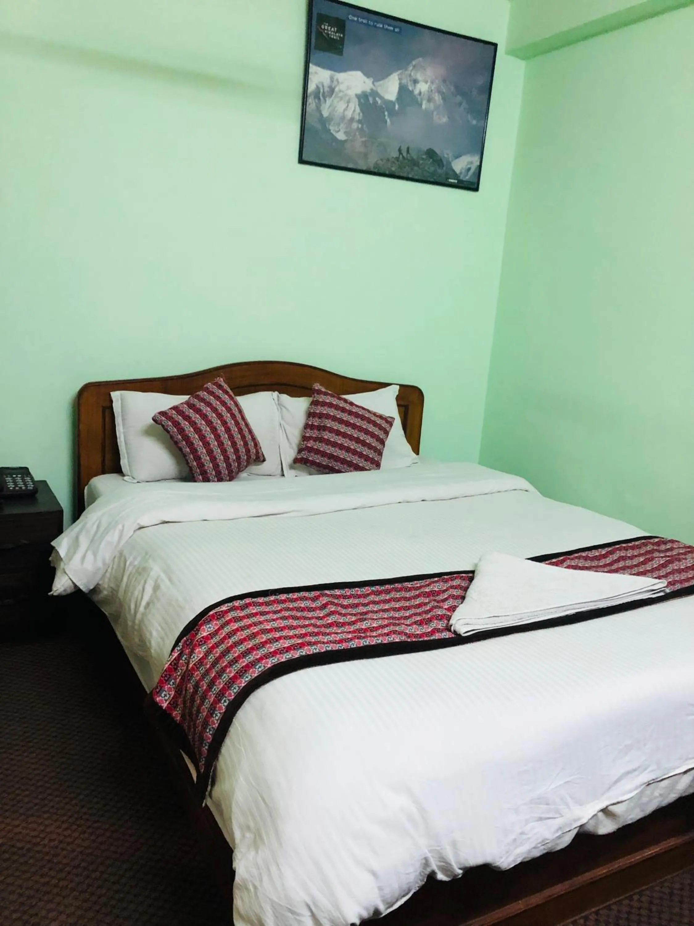 Bed in Yeti Cozy Hotel