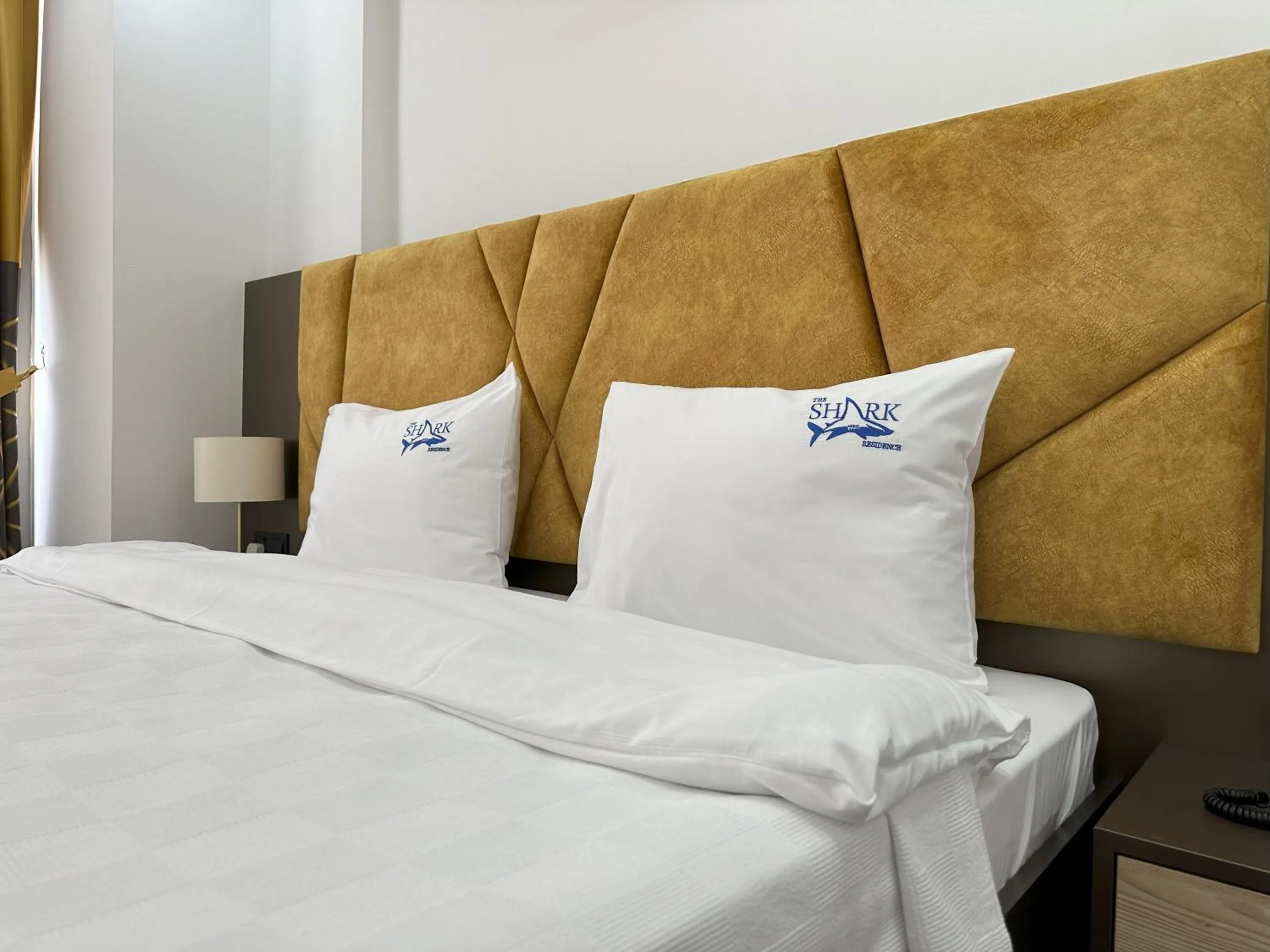 Bed in Nurel Shark Residence