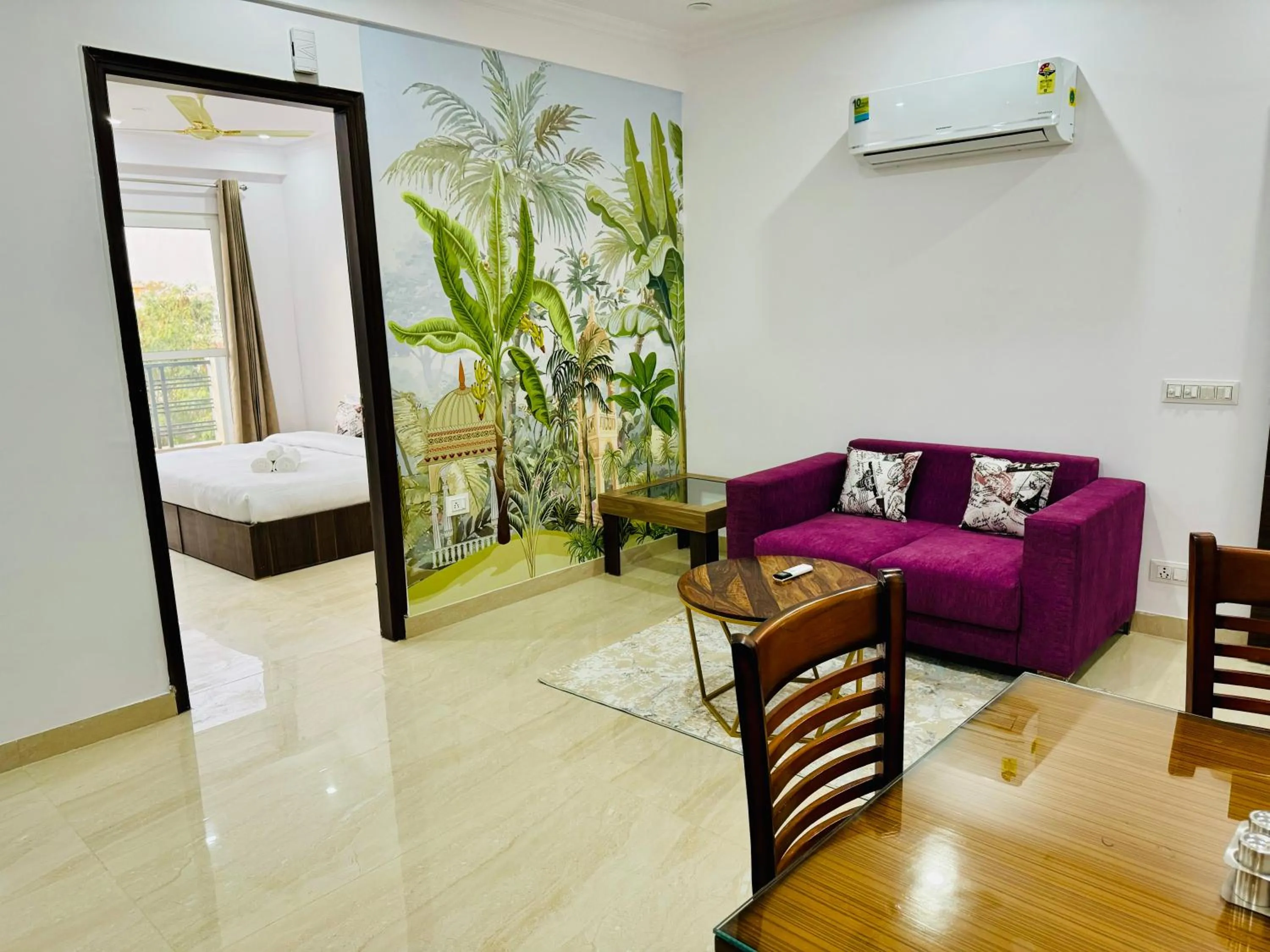 Living room, Bed in ZEN Suites - Golf Course Road Gurgaon