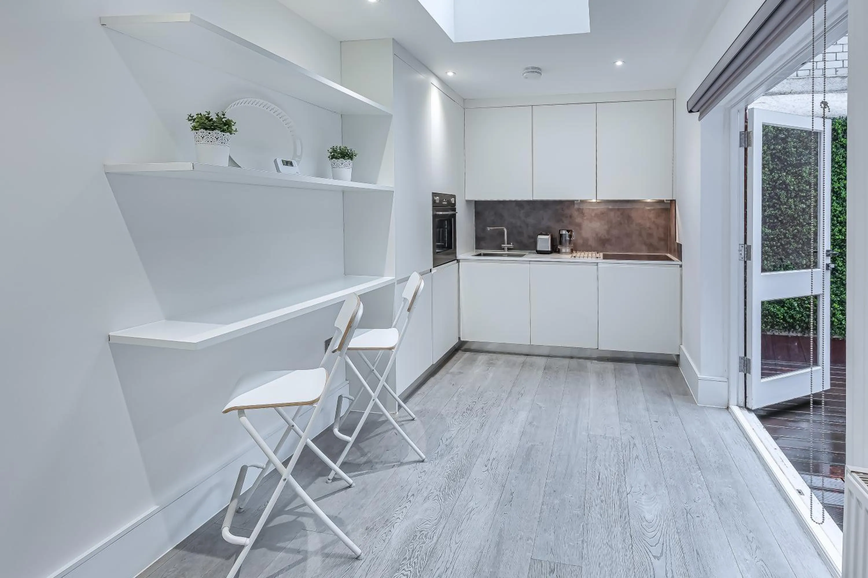 Kitchen or kitchenette in Green Street Residences by Aeria Apartments