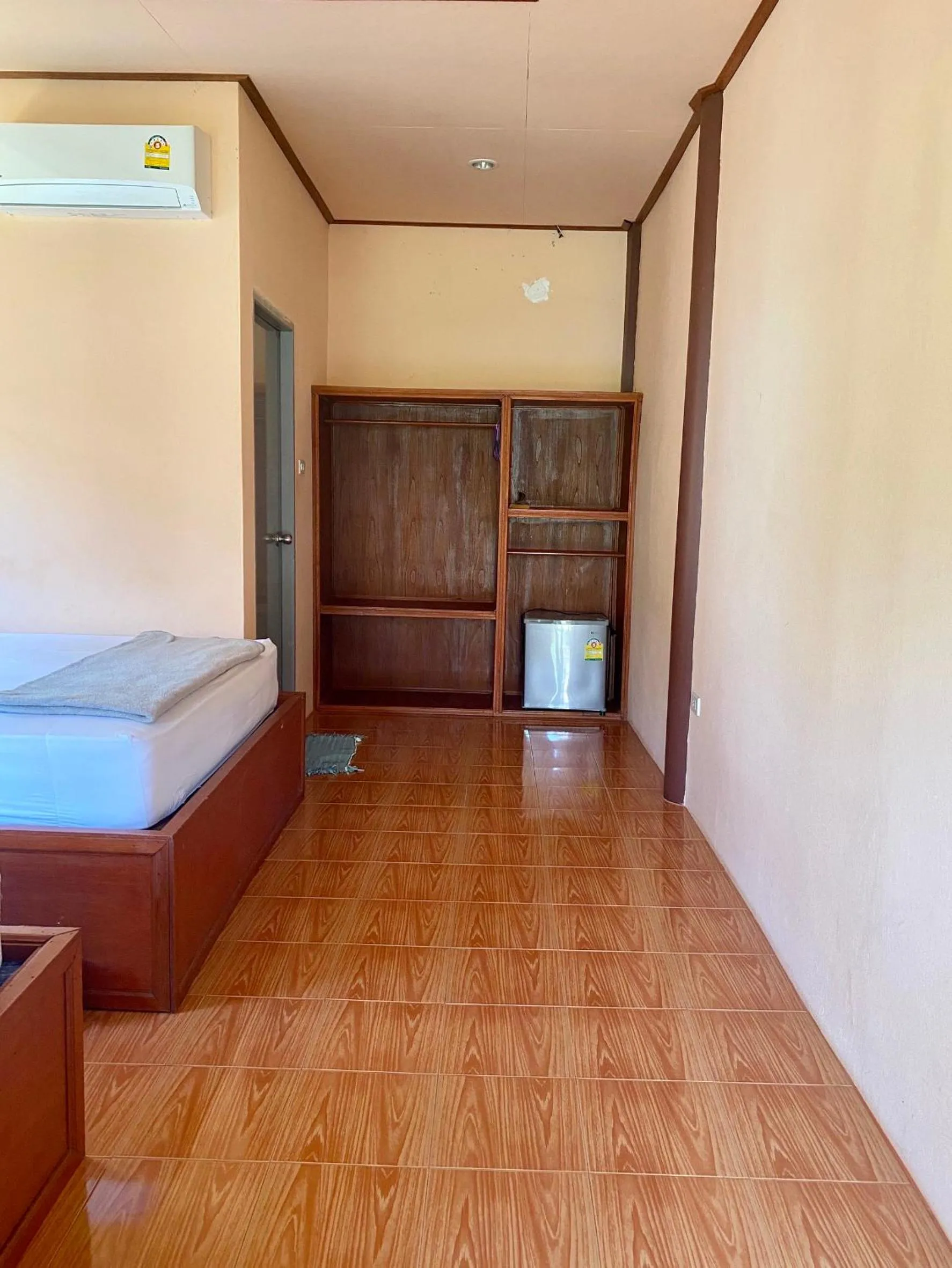 Bed in Rainbow Bungalow Haadrin Koh Phangan