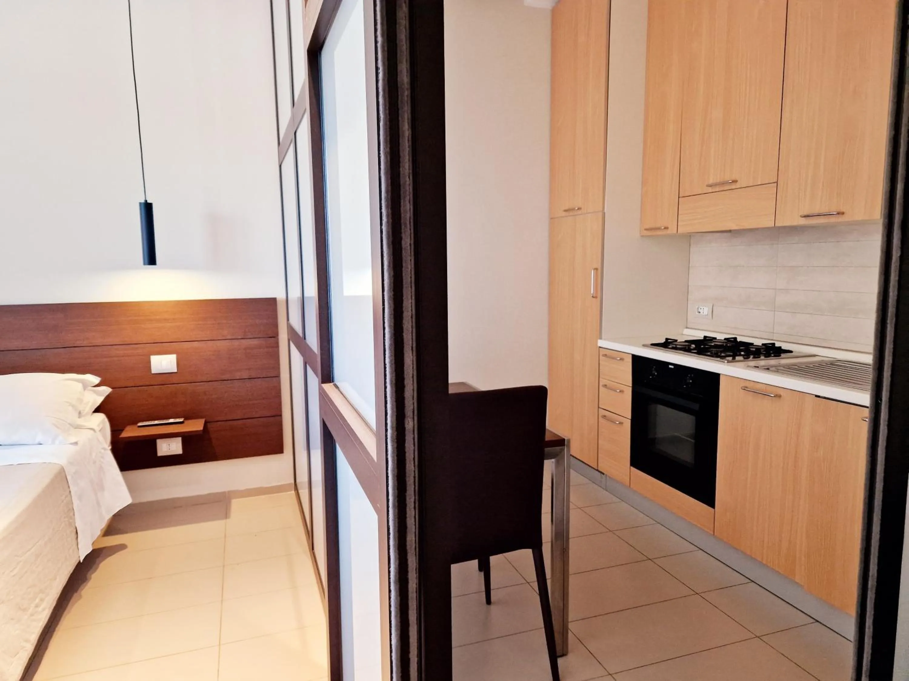 Kitchen or kitchenette, Bed in Martur Resort