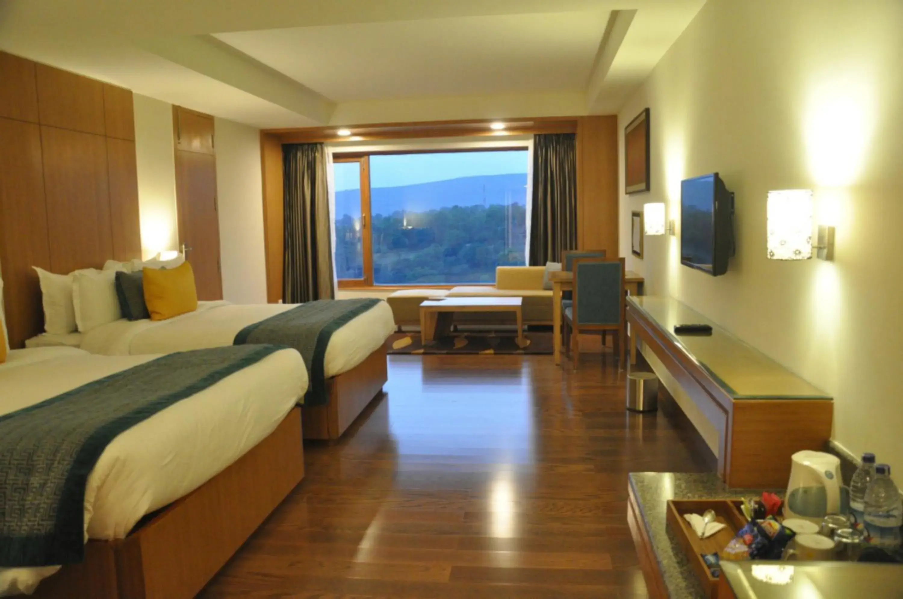 Photo of the whole room, Bed in Lemon Tree Hotel, Dehradun Photo of the whole room, Bed in Lemon Tree Hotel, Dehradun