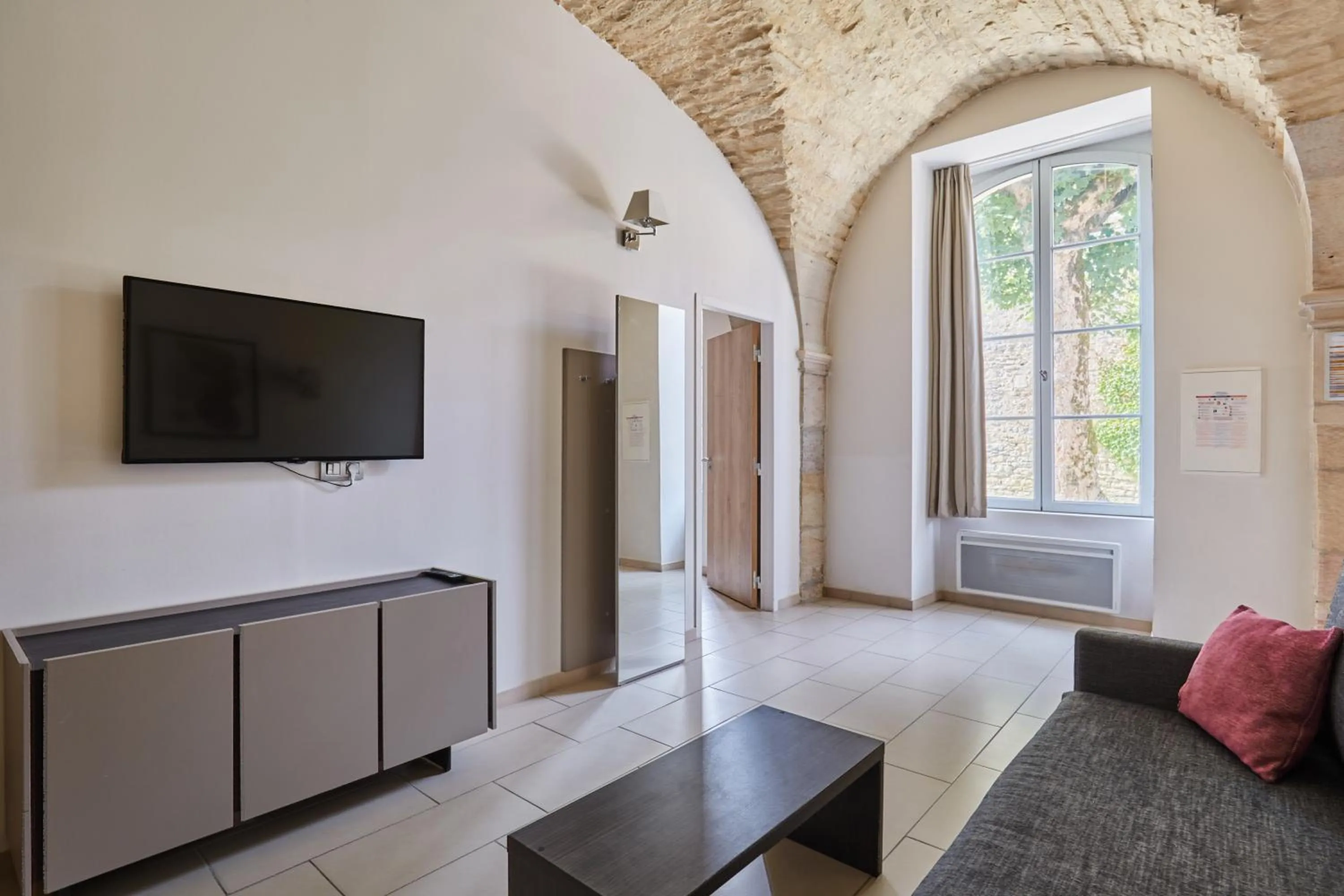 Seating area in Appart'hôtel Odalys City - Dijon Centre Les Cordeliers