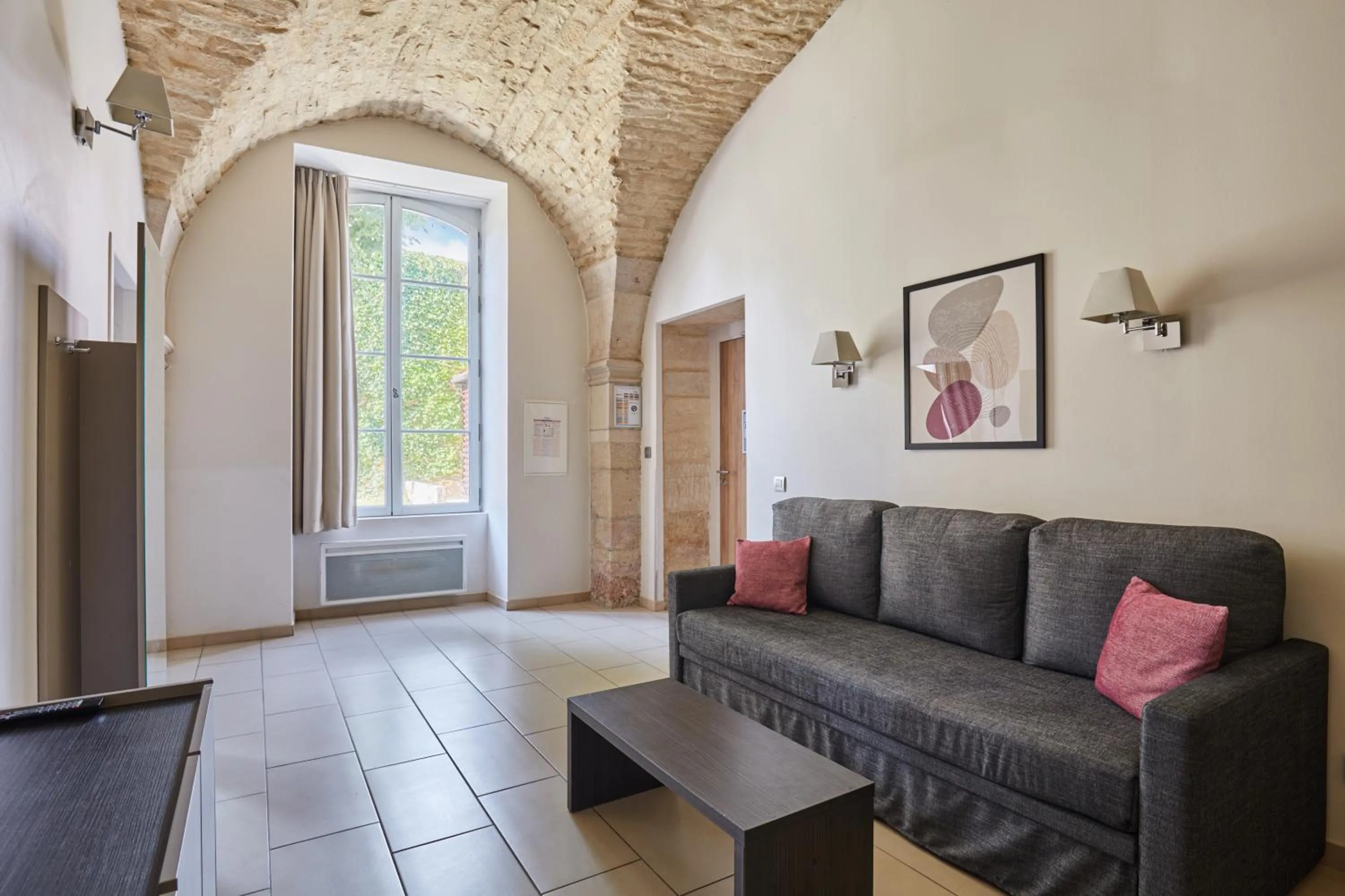 Seating area in Appart'hôtel Odalys City - Dijon Centre Les Cordeliers