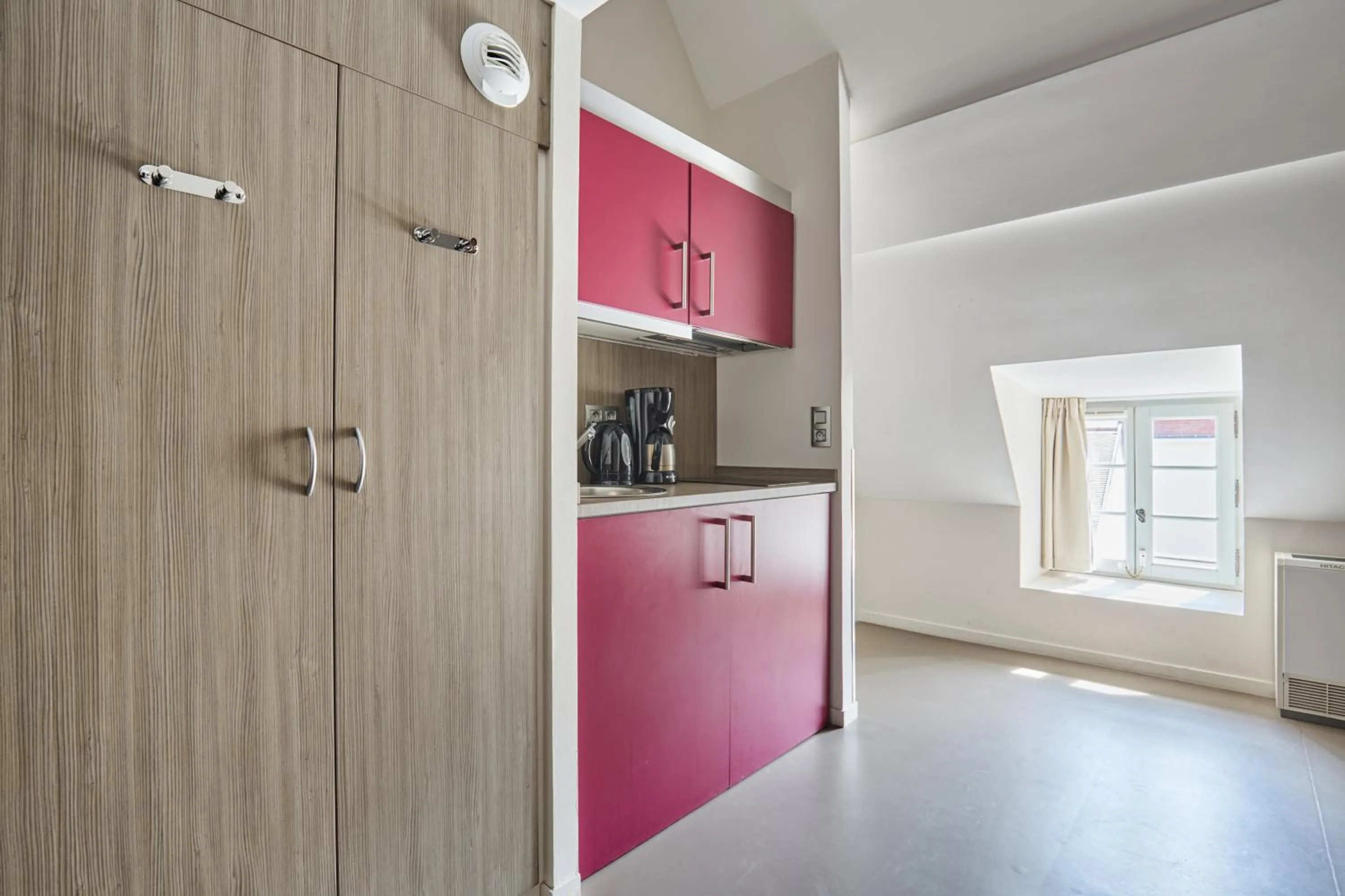 Kitchen or kitchenette in Appart'hôtel Odalys City - Dijon Centre Les Cordeliers