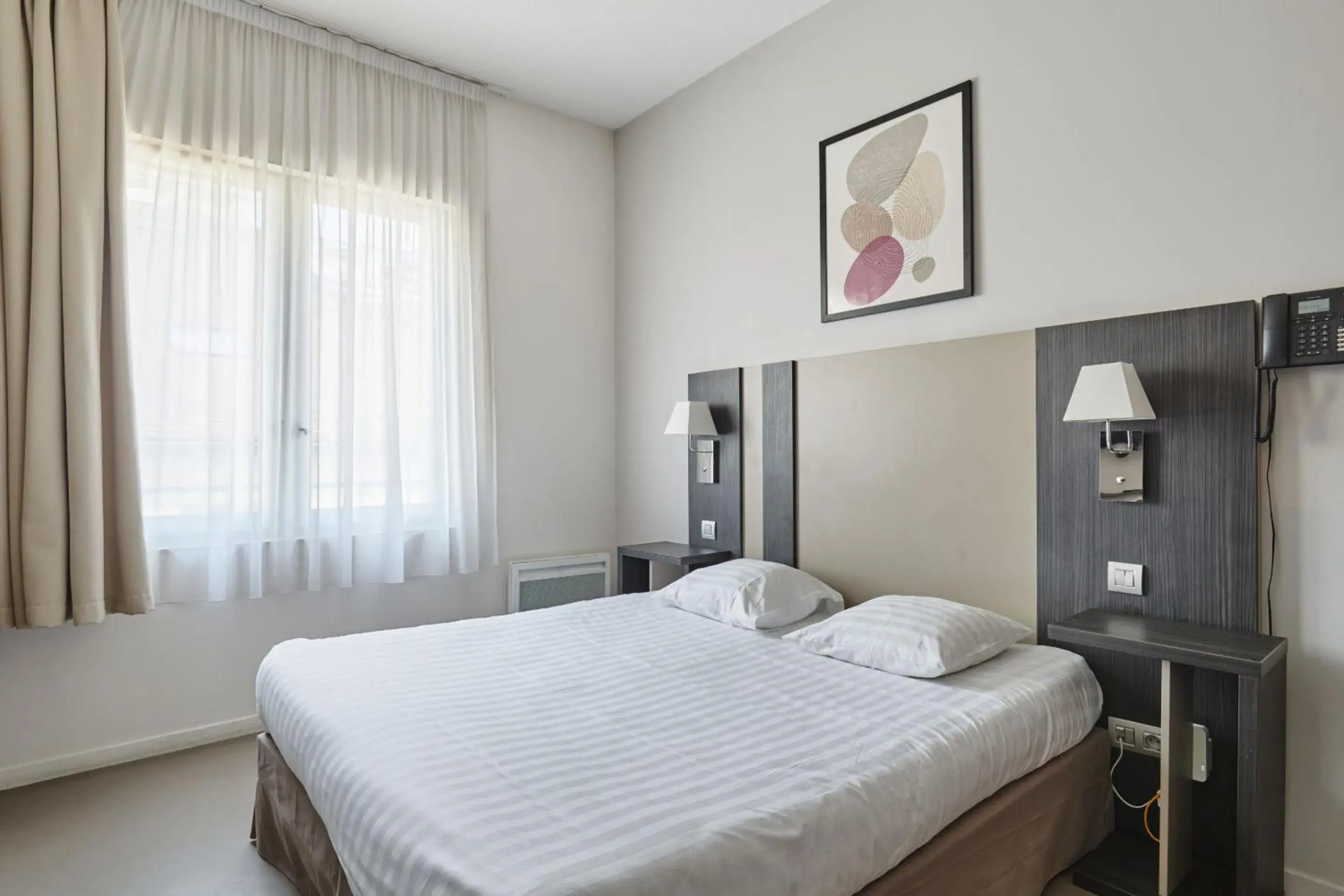 Bed in Appart'hôtel Odalys City - Dijon Centre Les Cordeliers Bed in Appart'hôtel Odalys City - Dijon Centre Les Cordeliers