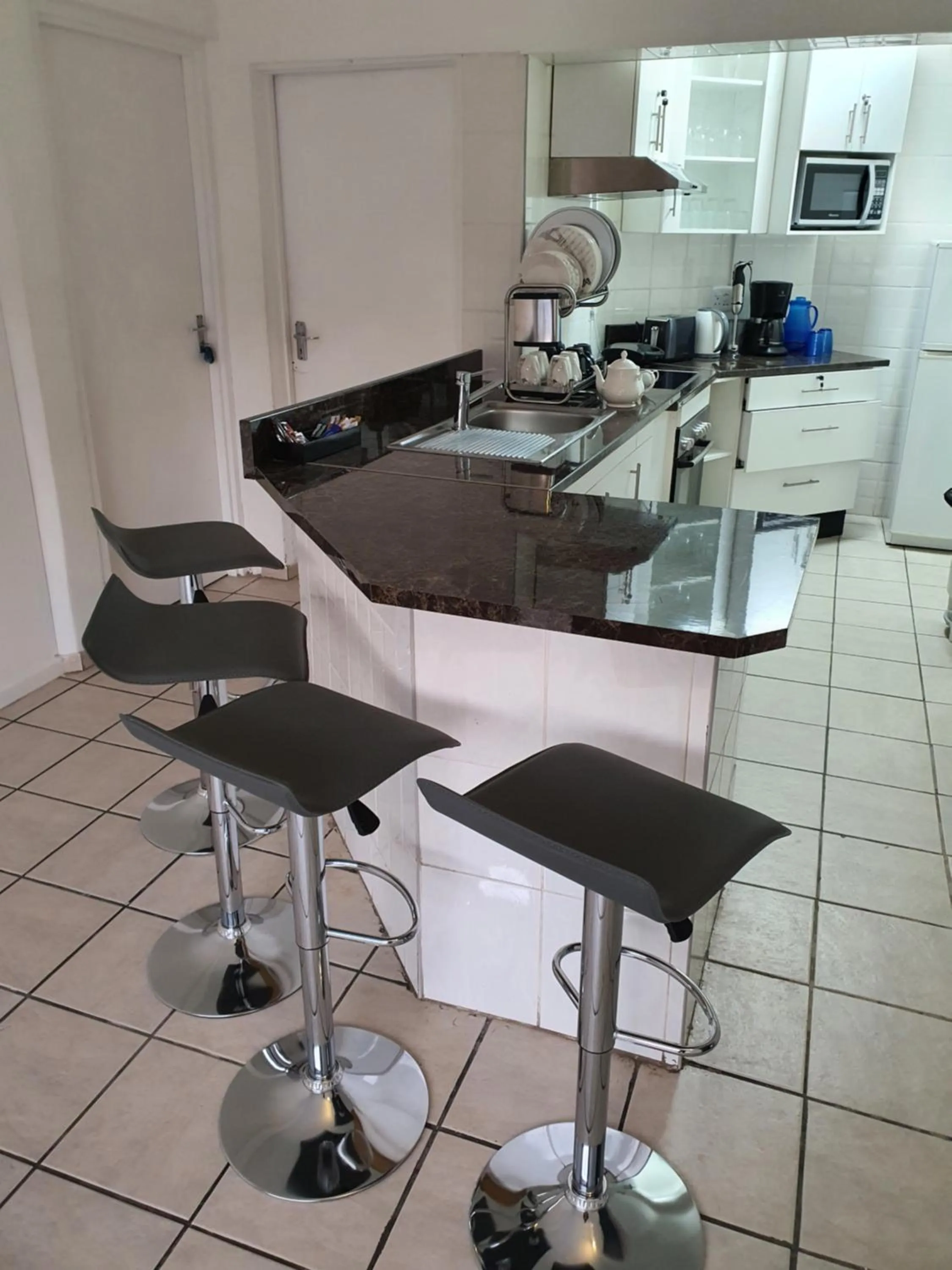 Kitchen or kitchenette in Sunnyridge Lodge