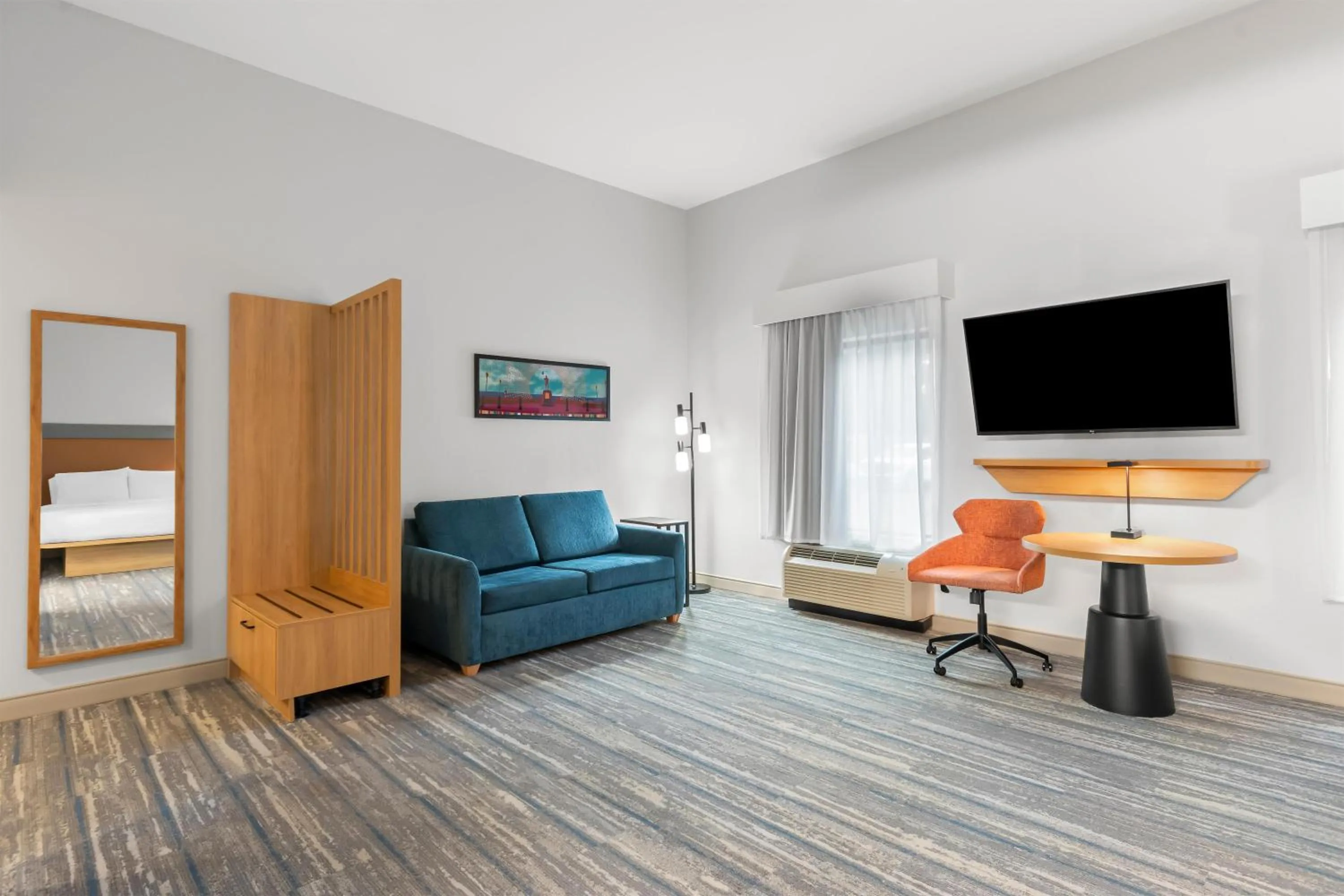 Living room in Hampton Inn & Suites Pensacola/I-10 Pine Forest Road