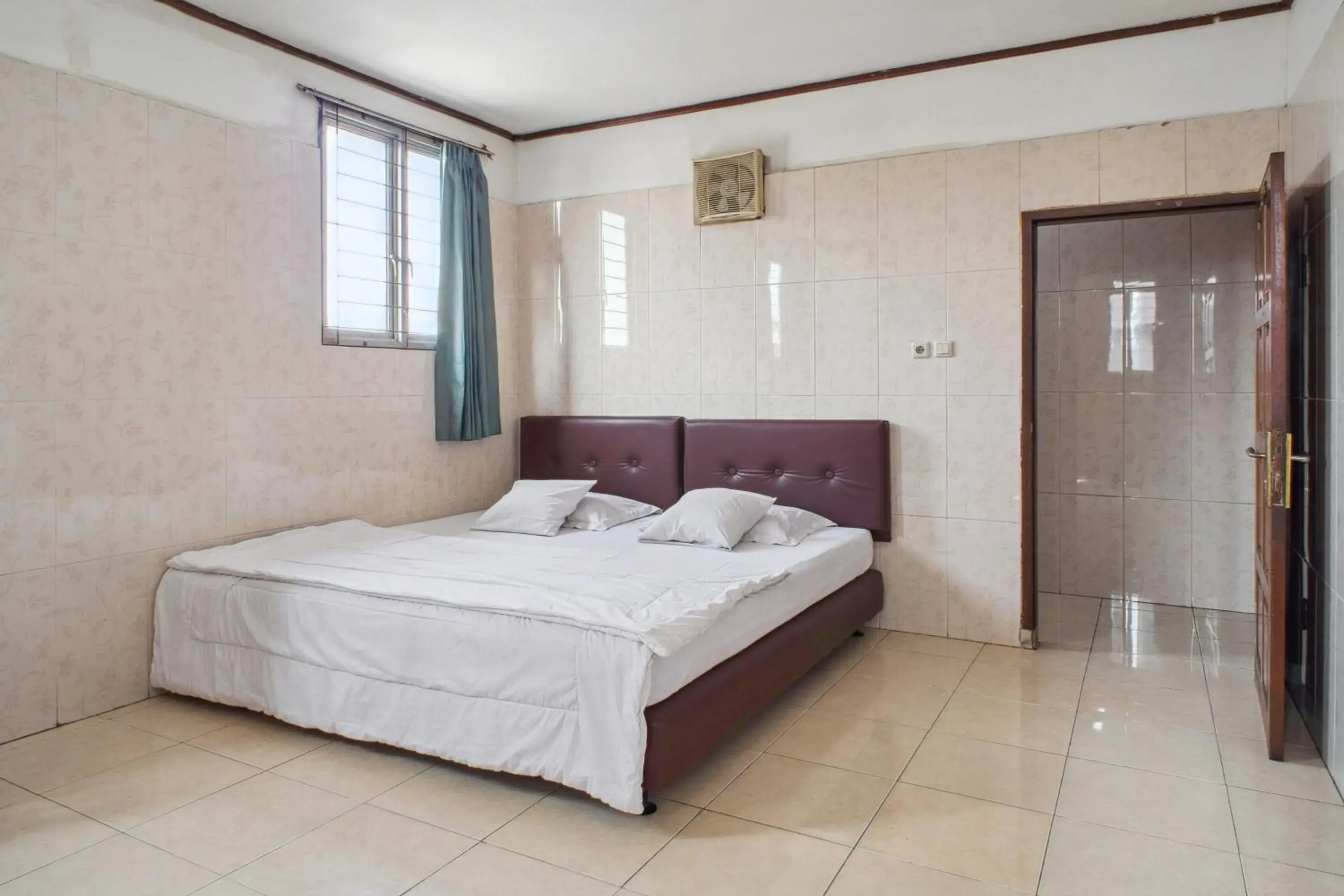 Bed in Wisma Rumka Bed in Wisma Rumka