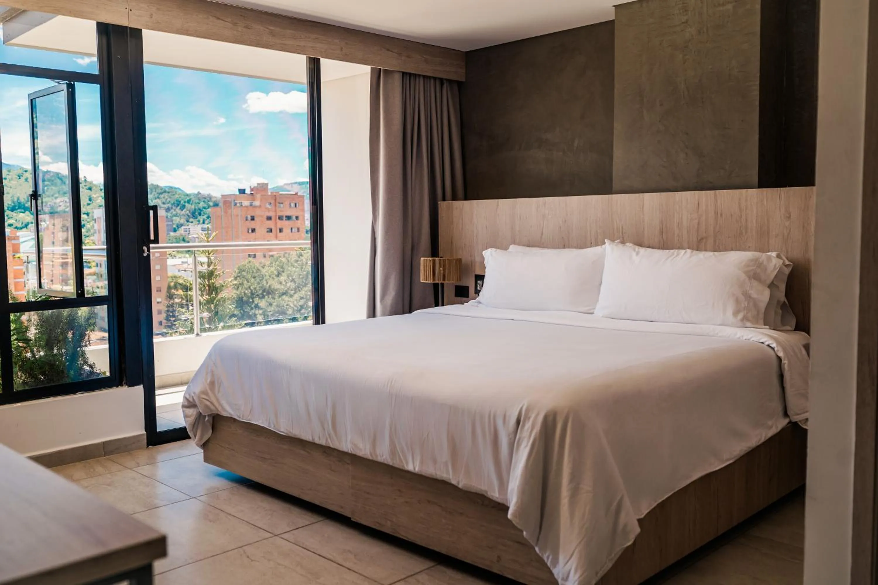 Bed in Sonata 44 Hotel Laureles